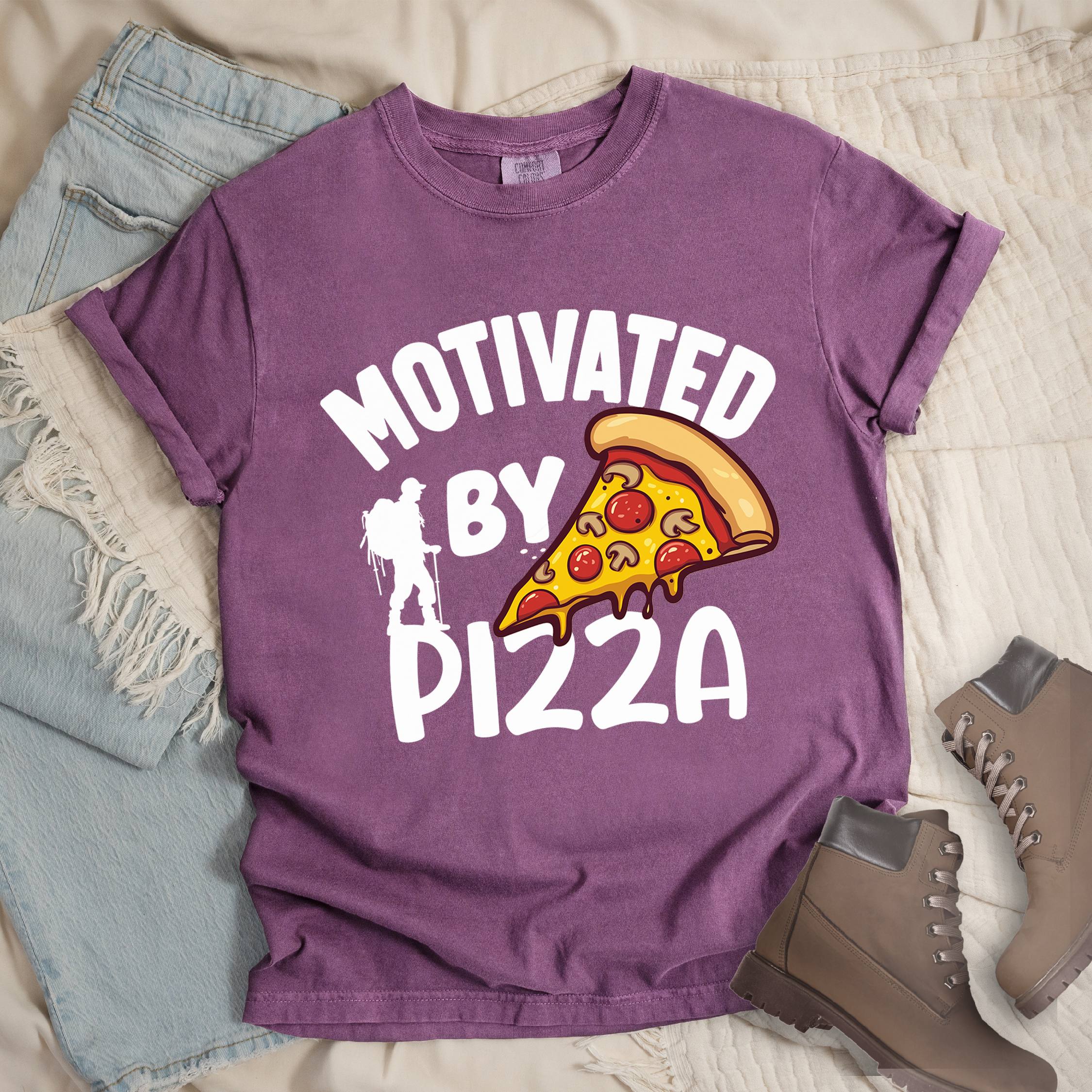 Dark pink shirt showing a hiking design with 'Motivated By Pizza' phrase and an illustration of a slice of pizza