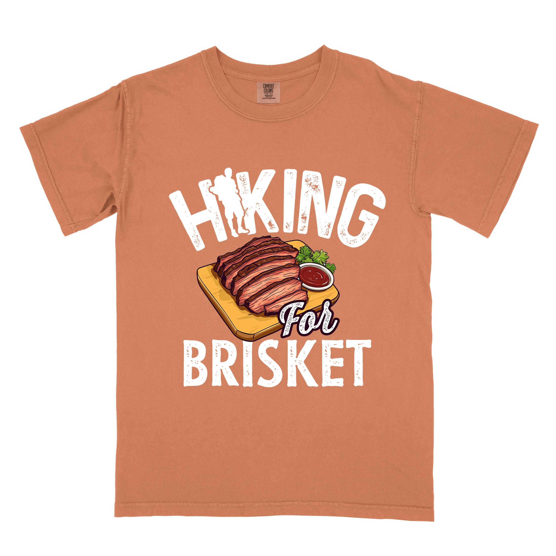 Yam Hiking for brisket colored vintage tee with bold typography, illustrated sliced brisket, birds, and backpacker for brisket lovers