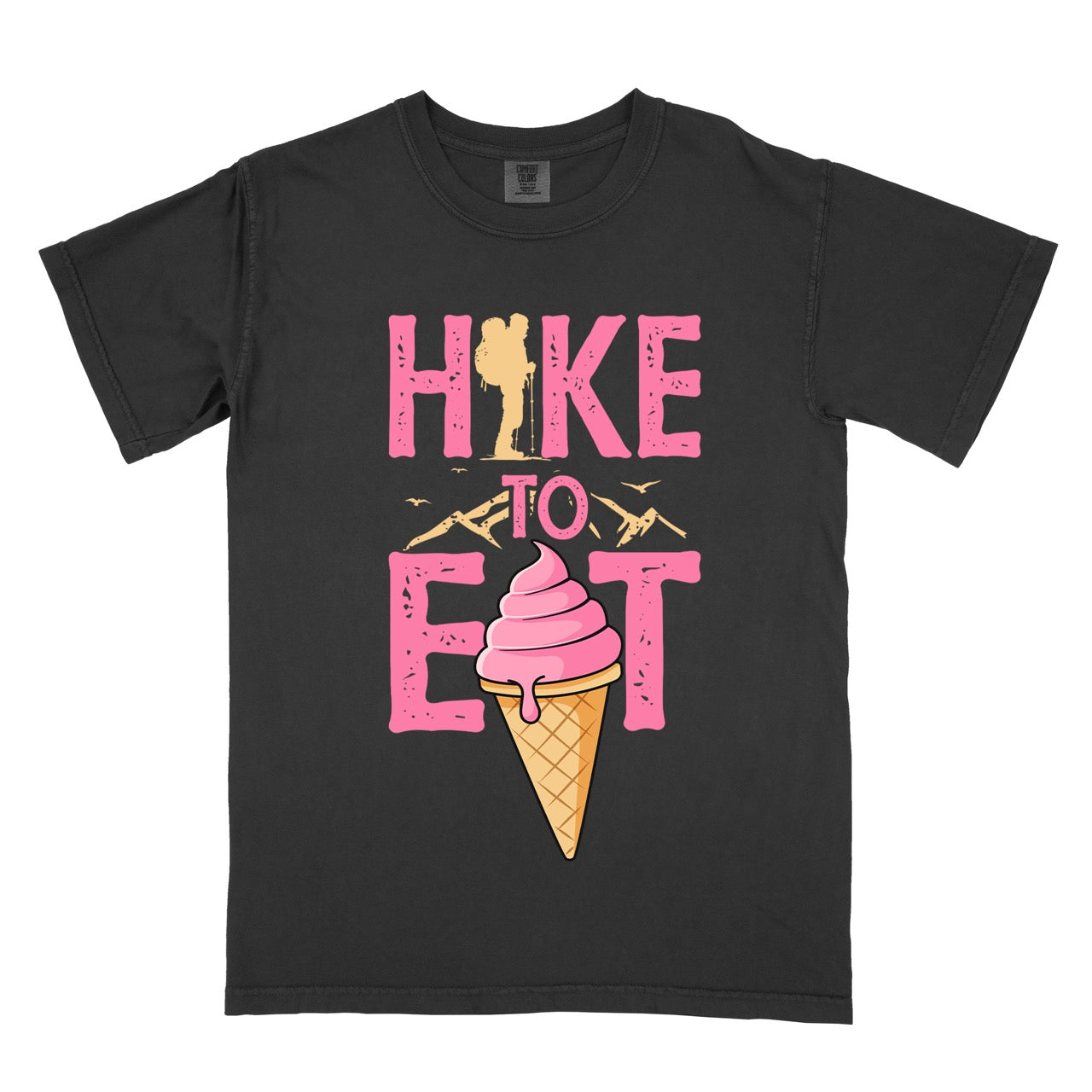 Black colored Hike to Eat brand logo t-shirt with distressed pink typography, hiker silhouette integrated into letters, mountain peaks, flying birds, and soft-serve ice cream cone illustration for dessert-loving outdoor enthusiasts