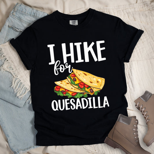 Black shirt with “I Hike for Quesadilla” text, featuring two folded quesadillas filled with cheese, tomatoes, and lettuce.