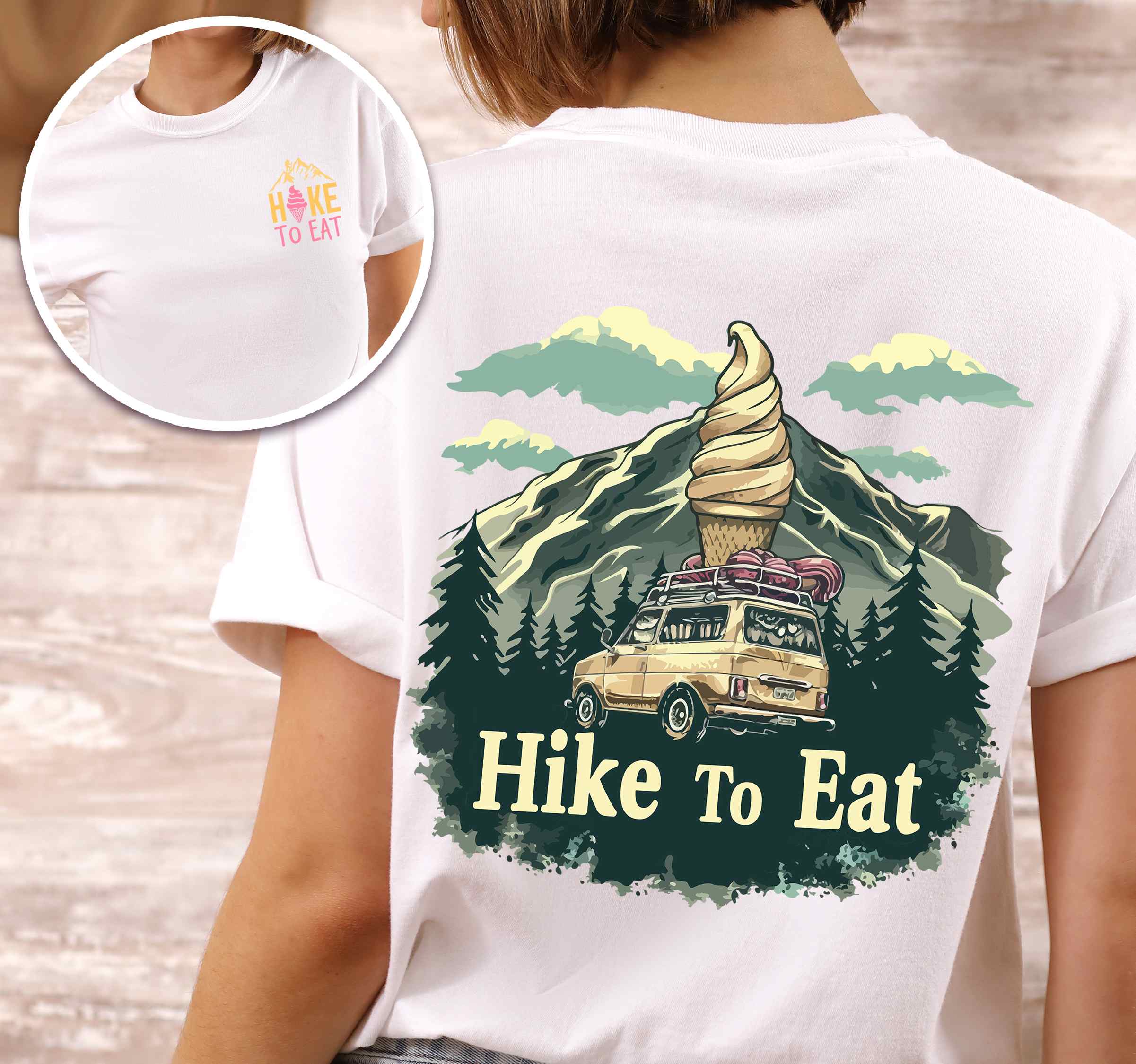 Woman wearing white colored vintage tee with front and back design "Hike to Eat" text in cream lettering, mountains, birds, illustrated icecream cone, and backpacker for dessert lovers.