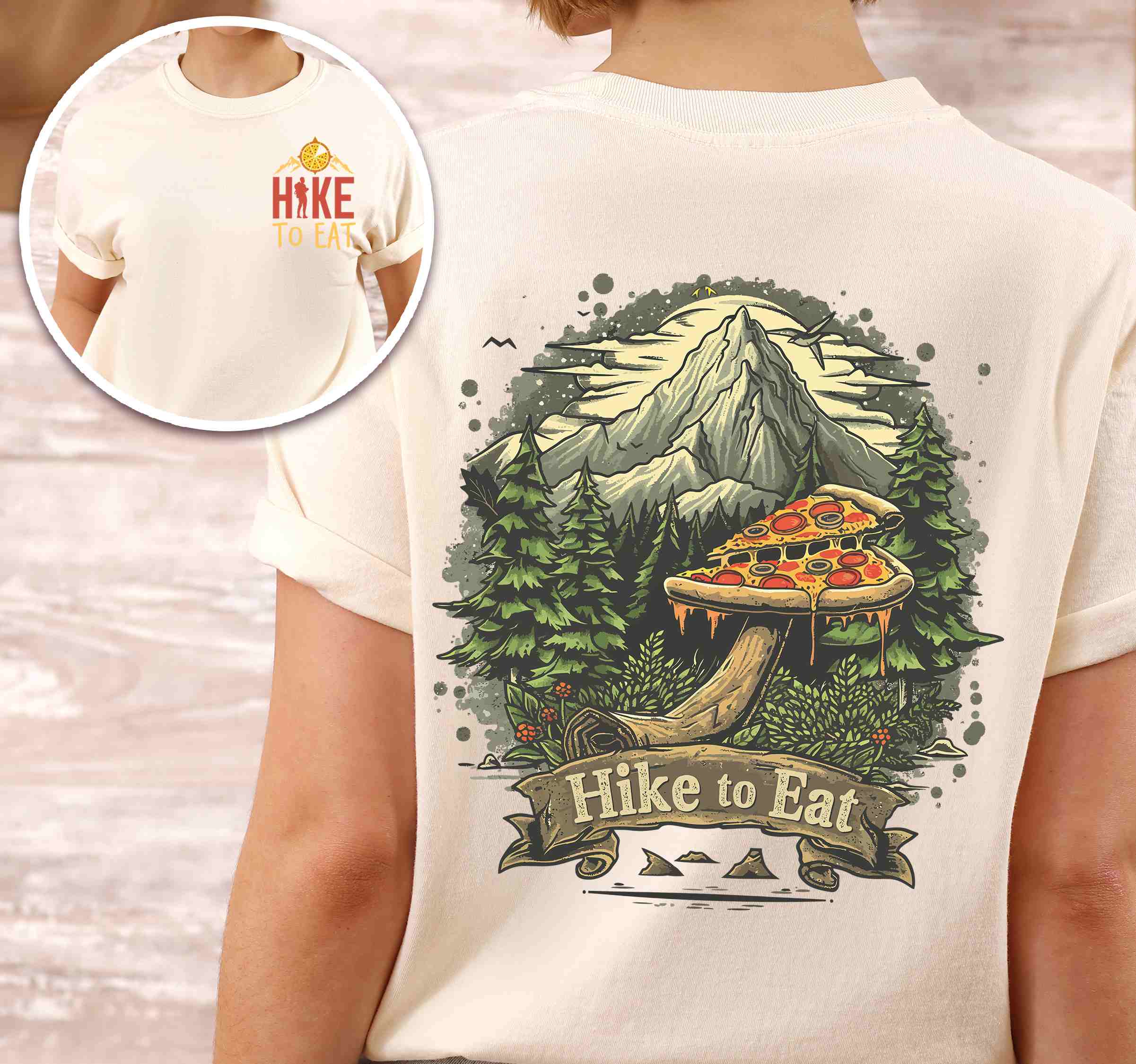 Woman wearing ivory colored vintage tee with front and back design "Hike to Eat" text in cream lettering, mountains, birds, illustrated pizza slice mushroom top, and backpacker for pizza lovers.