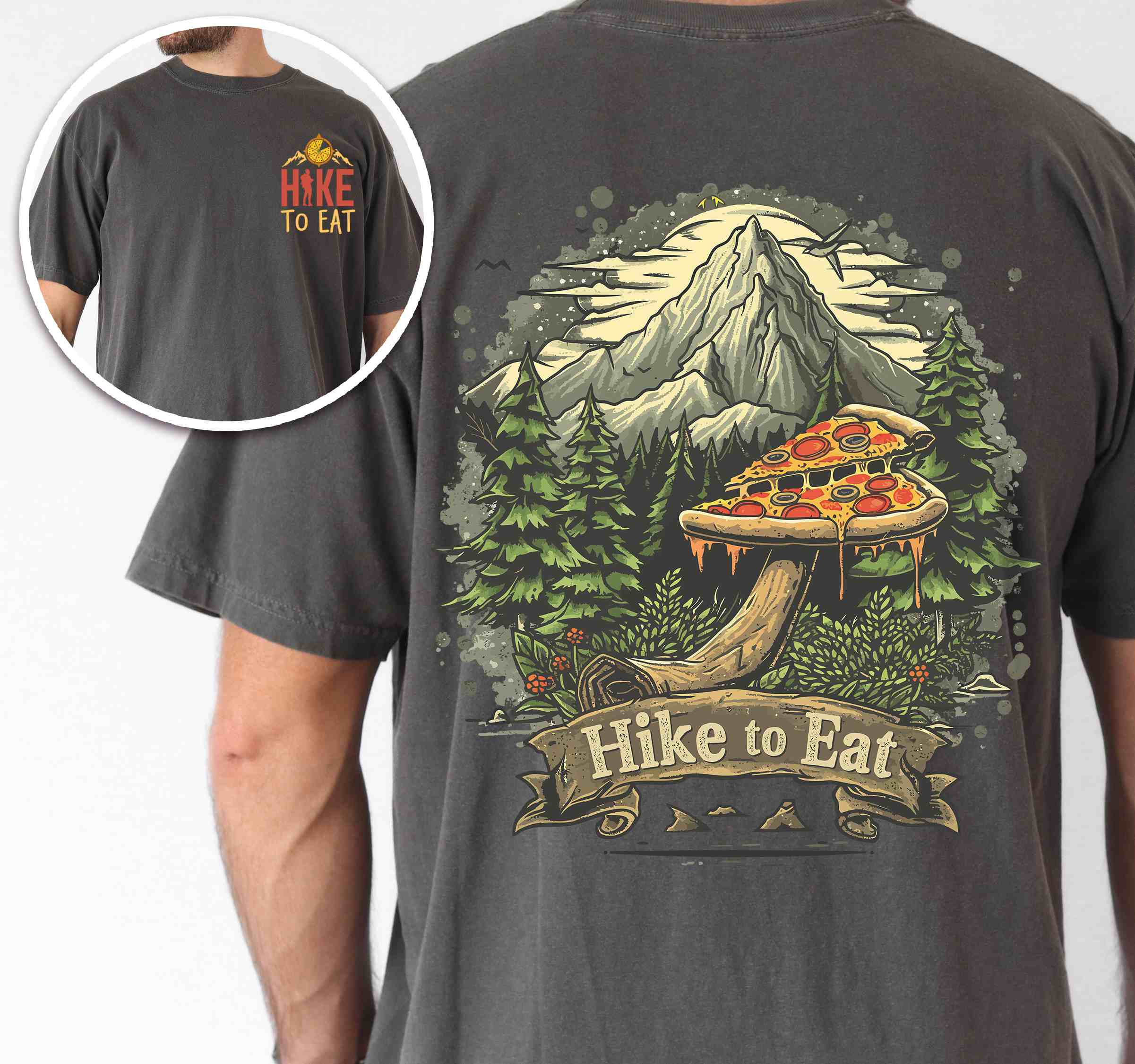 Man wearing pepper colored vintage tee with front and back design "Hike to Eat" text in cream lettering, mountains, birds, illustrated pizza slice mushroom top, and backpacker for pizza lovers.