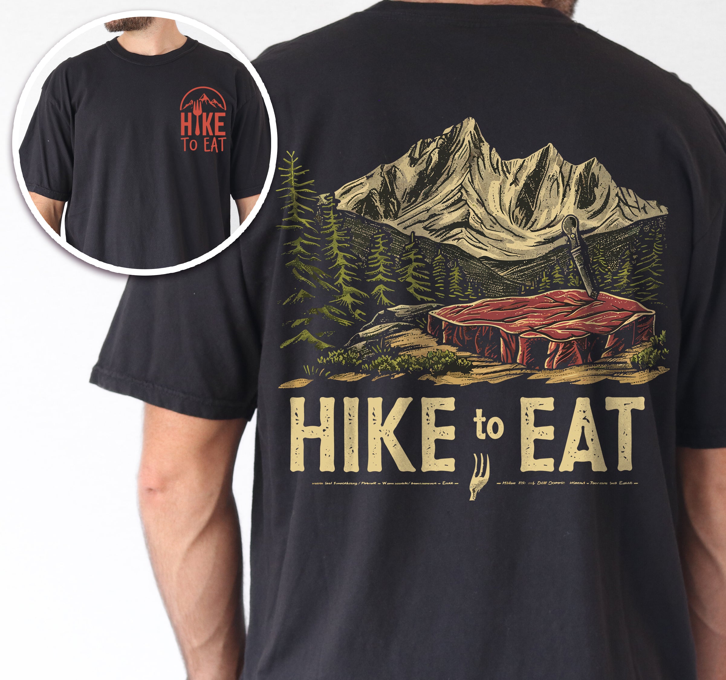 Black Hike to Eat t-shirt front and back view showing small chest logo and large back design featuring raw steak in mountain wilderness landscape with pine trees