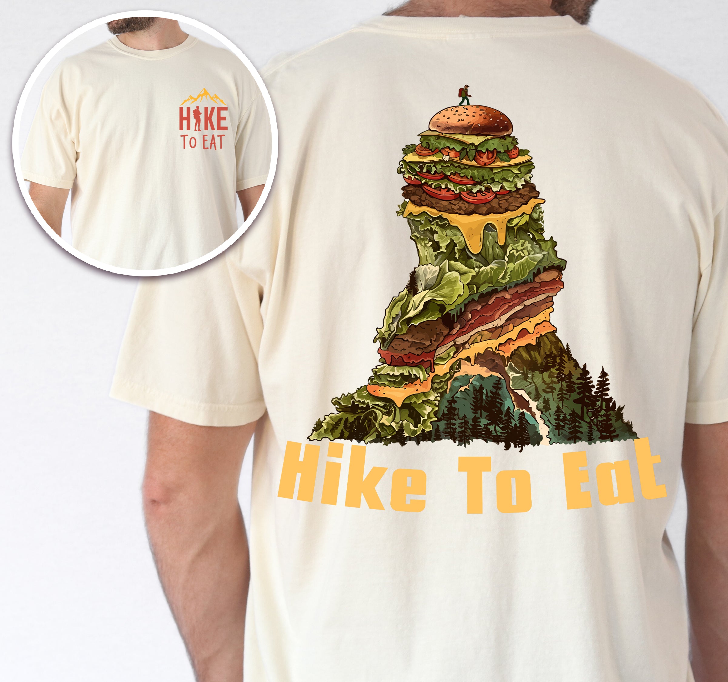 Ivory (Cream White) Hike to Eat t-shirt front and back view showing small orange chest logo and large back design featuring mountain-shaped burger stack with multiple layers, lettuce, cheese, and pine forest at the base.