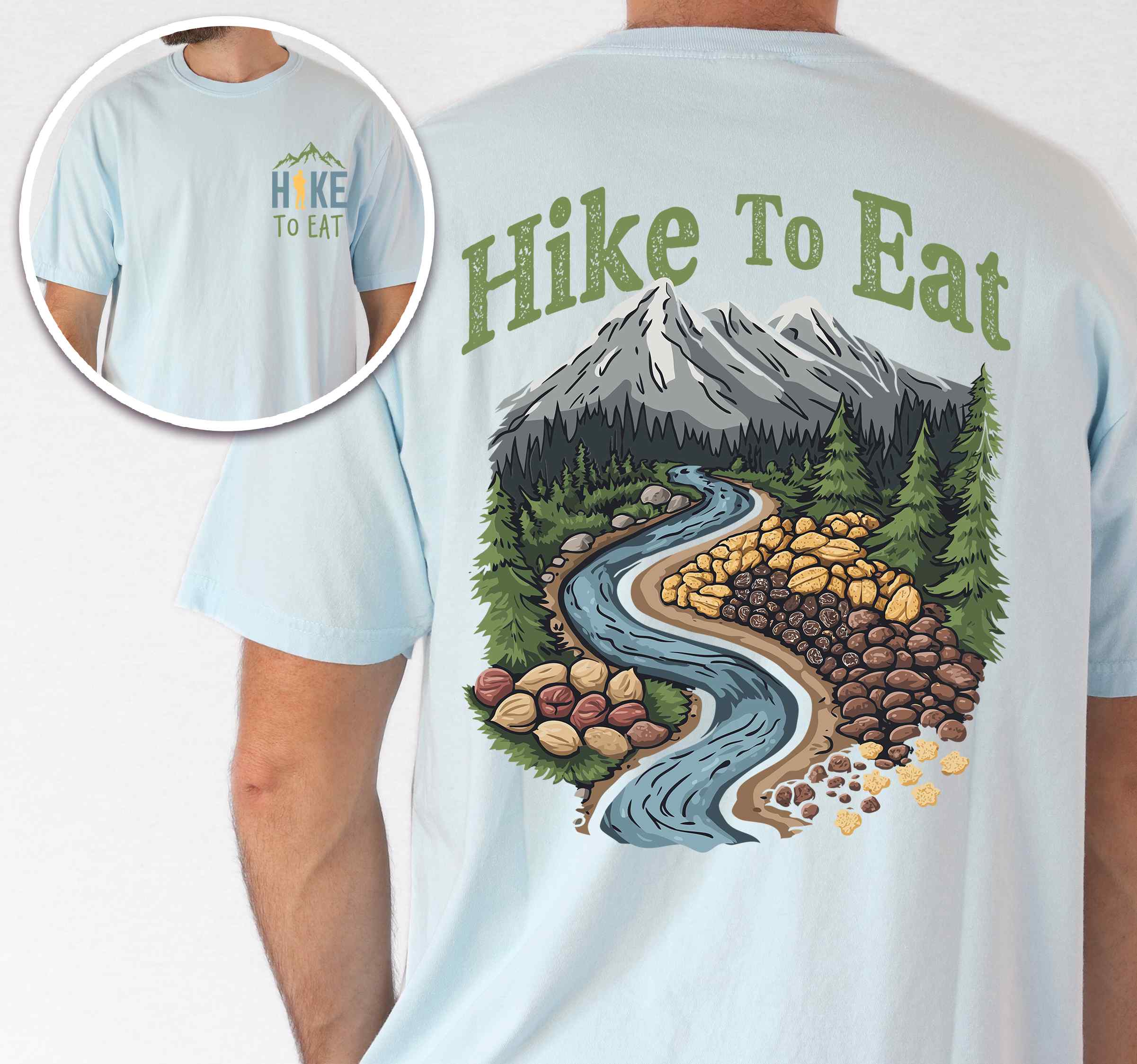 Man wearing chambray "Hike to Eat" text in bold lettering front and back design, mountains, birds, illustrated nuts and fruit trail mix, and backpacker for trail mix lover.