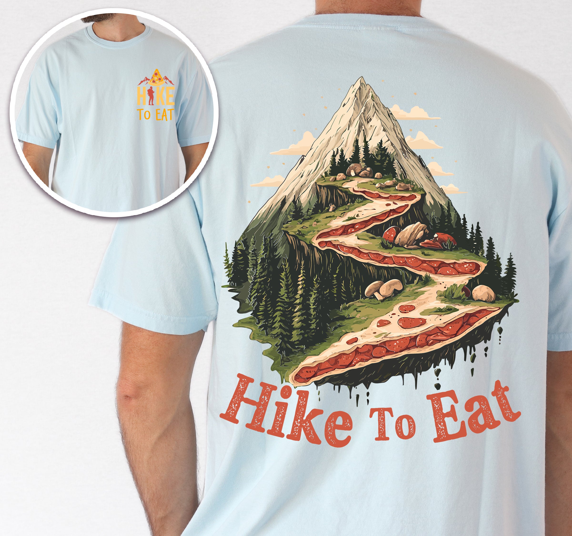 man wearing chambray "Hike to Eat" text in bold lettering front and back design, mountains, birds, illustrated stack of pizza slices, and backpacker for pizza lovers.