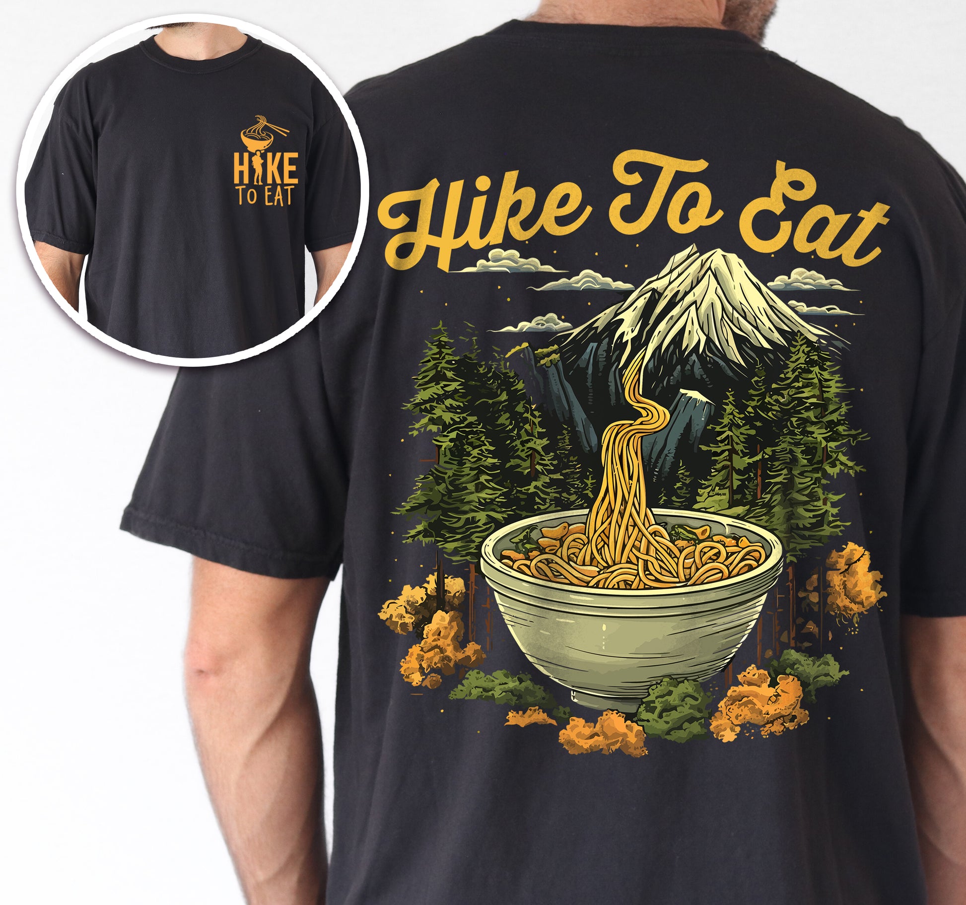 Black colored Hike to Eat t-shirt front and back view showing small colorful chest logo and large back design featuring ramen noodle bowl with mountain landscape background and pine trees.