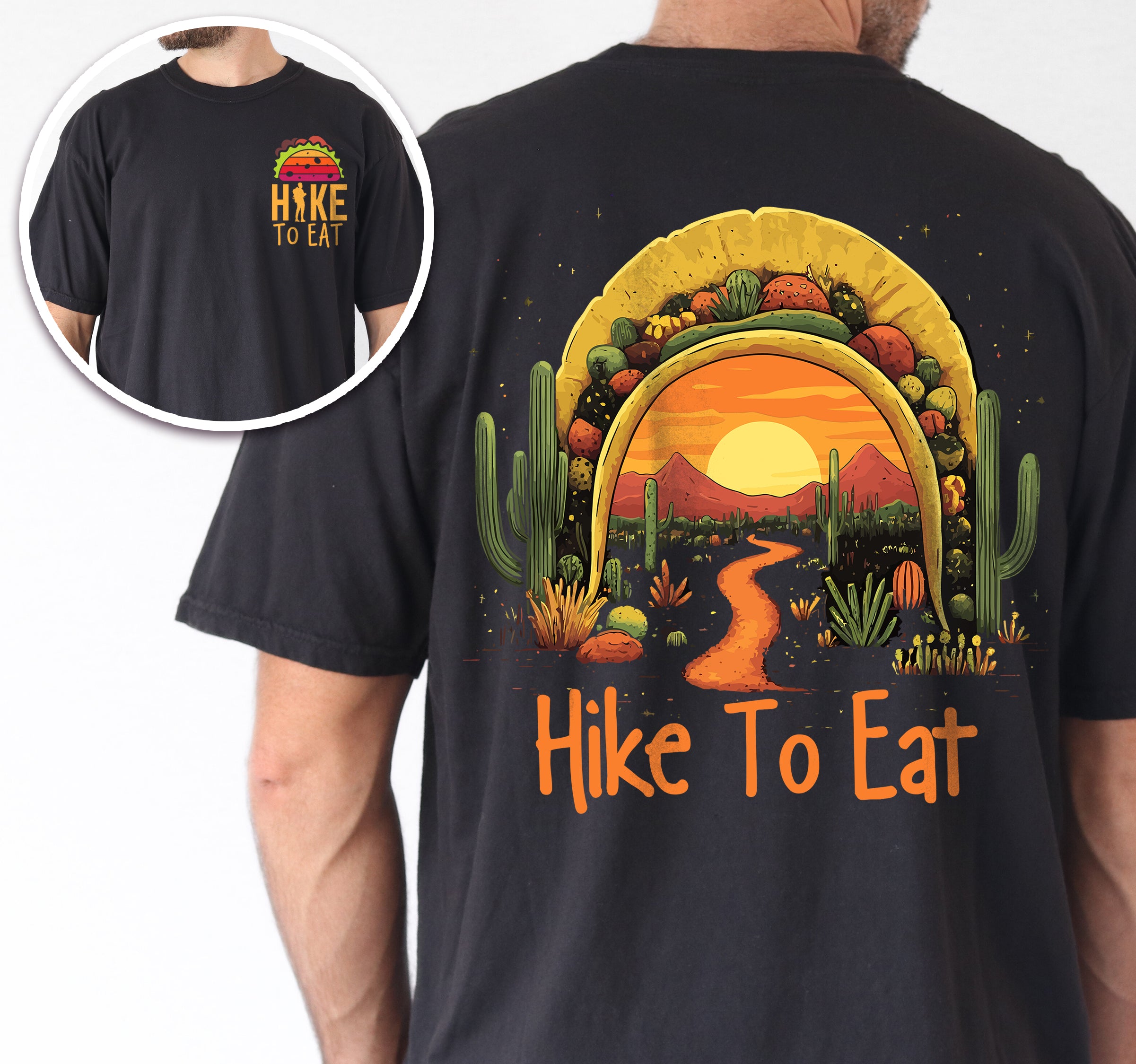 Black Hike to Eat t-shirt front and back view showing small colorful taco above chest logo and large back design featuring taco shell silhouette filled with orange sunset over desert landscape, winding hiking trail, tall saguaro cacti, desert plants, and starry night sky.