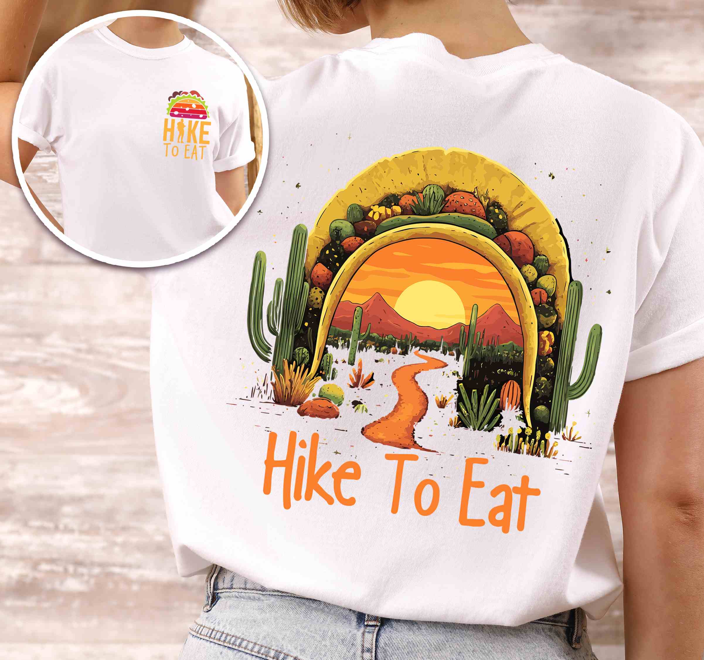 Woman wearing white "Hike to Eat" text in bold lettering front and back design, mountains, birds, illustrated sunset taco, and backpacker for taco lovers.