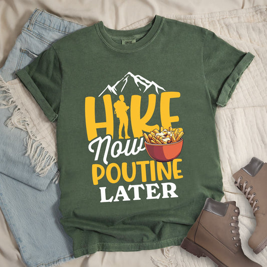 Dark green shirt with the text “Hike Now Poutine Later” featuring a hiker silhouette, mountain outline, and a bowl of poutine with fries, cheese curds, and gravy.