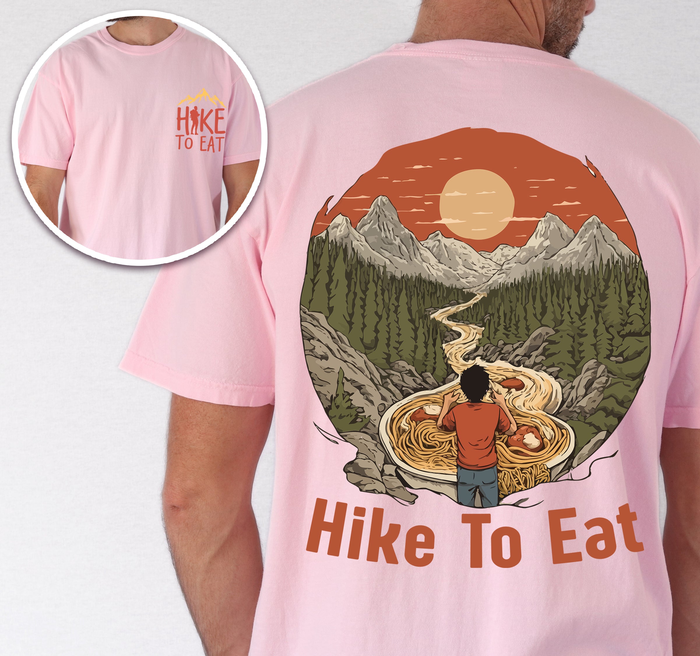 Blossom (Light Pink) Hike to Eat t-shirt front and back view showing small colorful chest detail and large back design featuring hiker standing by steaming bowl of noodles in circular mountain landscape with orange sunset and winding trail.