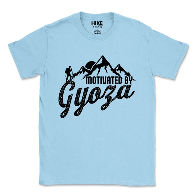 Light blue Dark Chocolate (brown) Motivated by Gyoza statement tee with distressed typography, mountain peaks, and hiker silhouette for gyoza lovers and japanese food lovers. 
