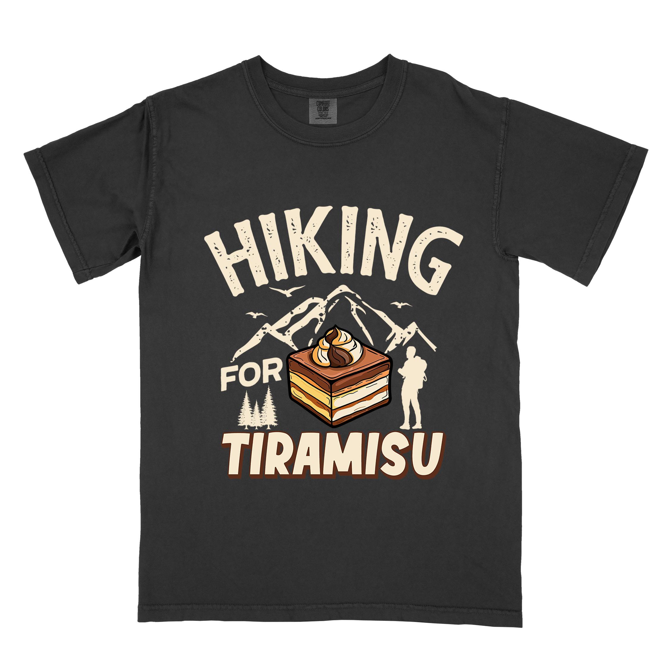 Black "Hiking for Tiramisu" colored vintage tee with bold typography, mountains, illustrated a serving of Tiramisu, and backpackers with a sweet tooth.