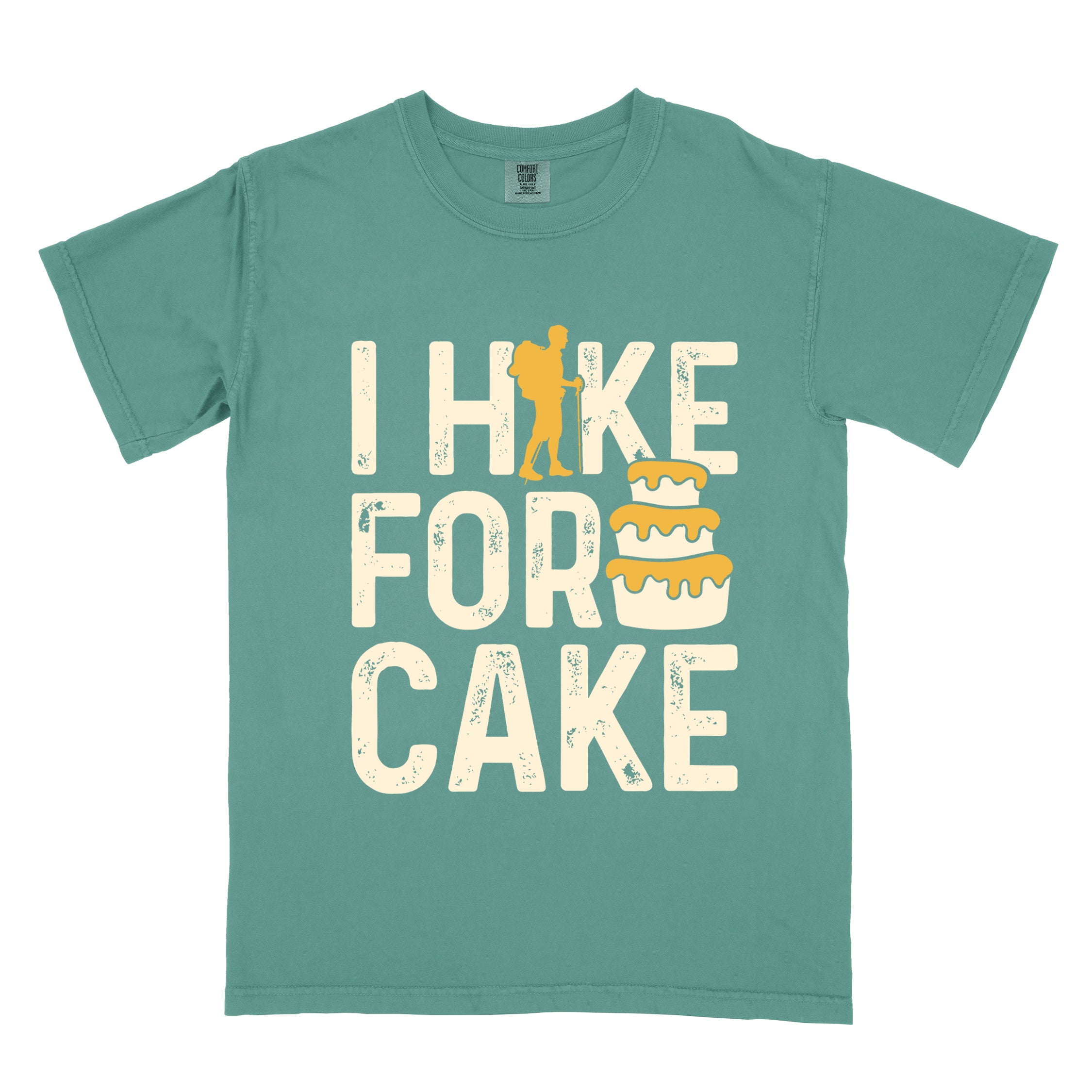 Light green I Hike for Cake vintage statement tee with distressed typography, hiker silhouette, and layered cake illustration on Comfort Colors shirt for dessert-loving outdoor enthusiasts