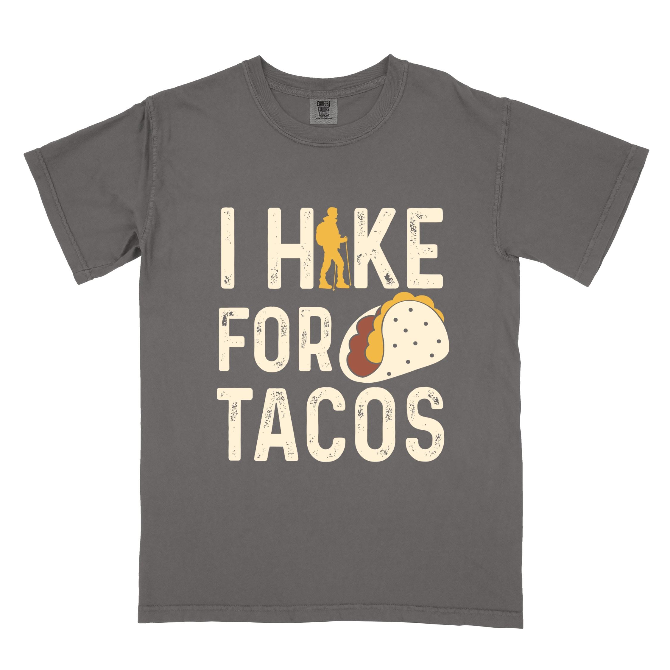 Pepper colored vintage tee with 'I Hike for Tacos' text in cream lettering, illustrated taco, and backpacker for taco lovers
