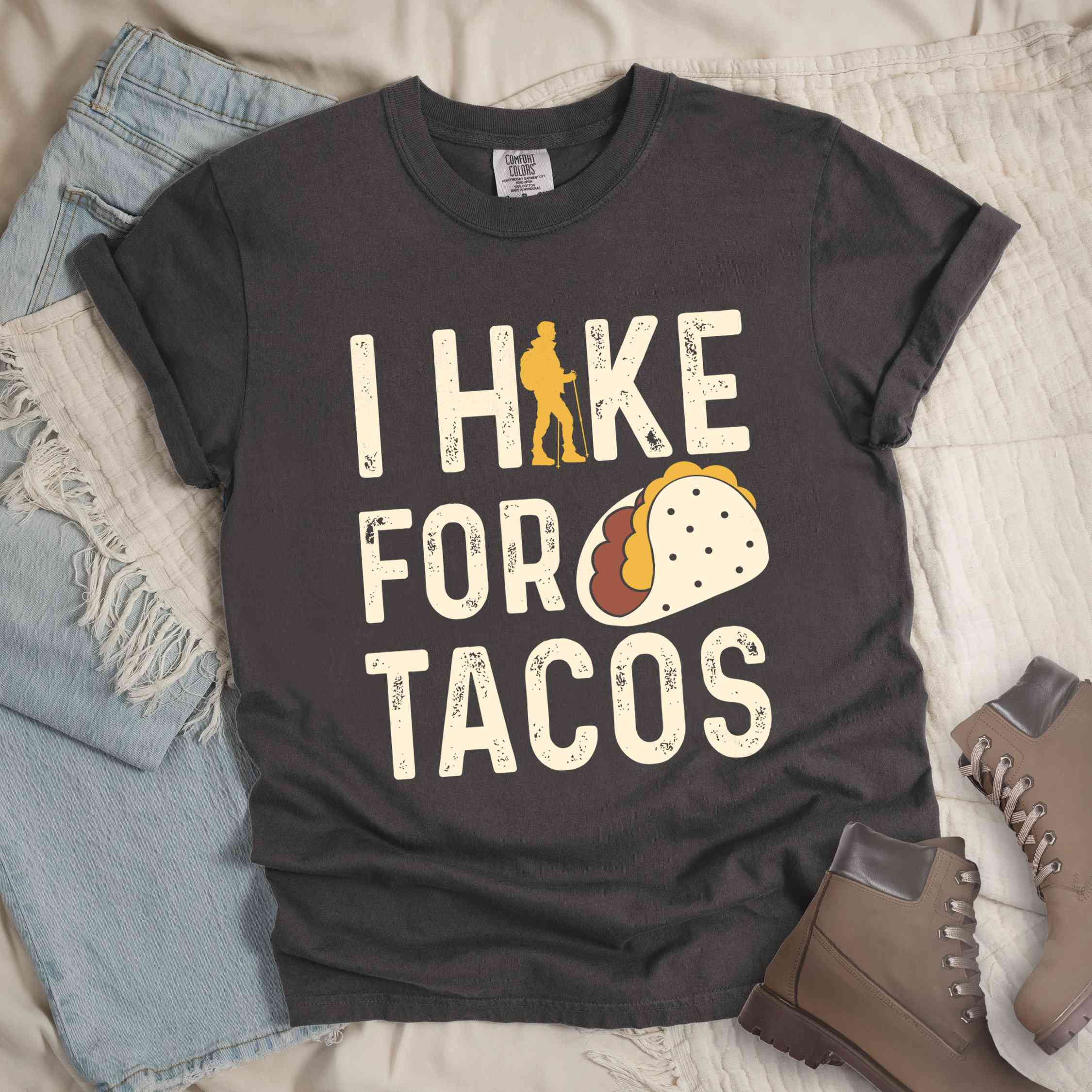 Pepper colored vintage tee with 'I Hike for Tacos' text in cream lettering, illustrated taco, and backpacker for taco lovers