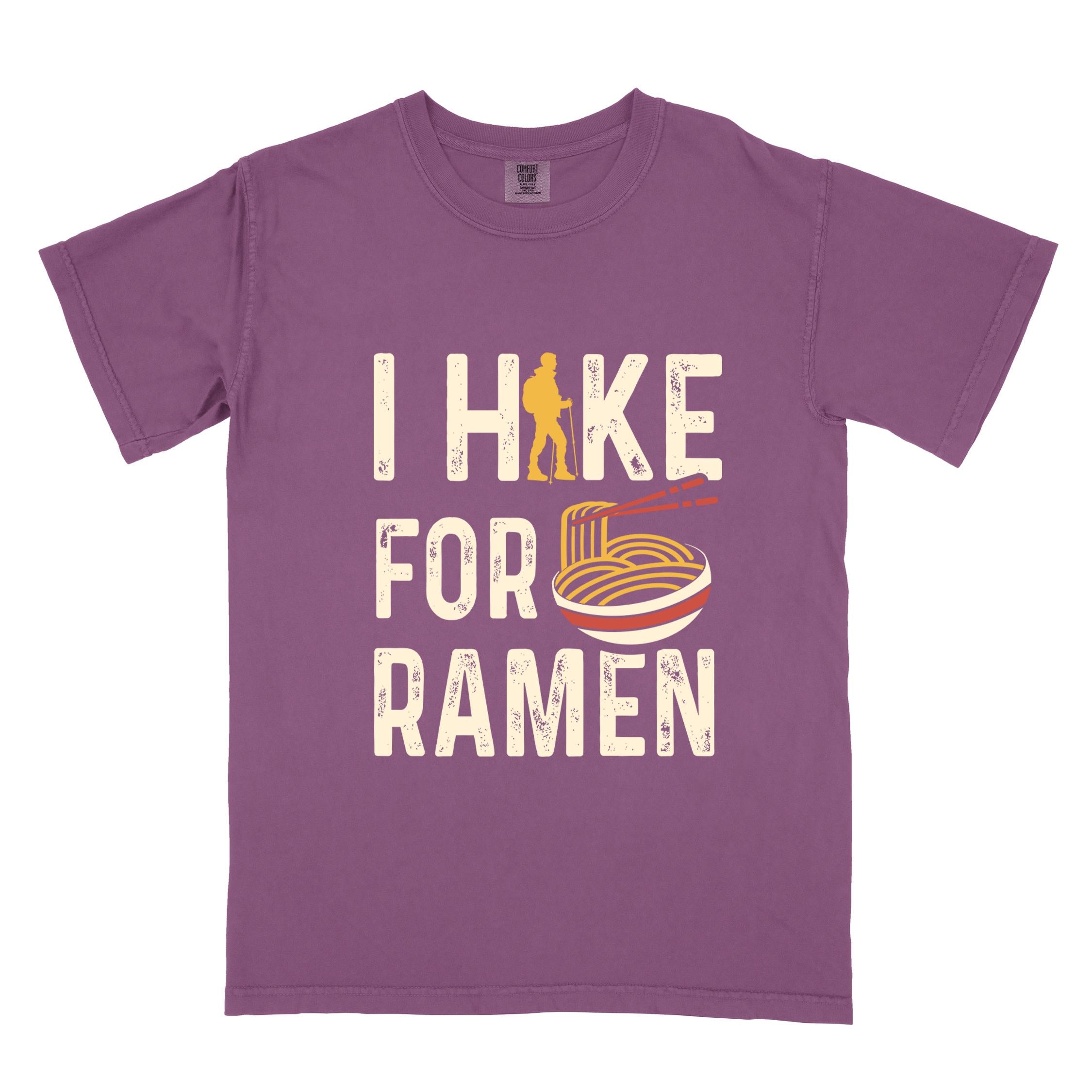 Berry colored vintage tee with 'I Hike for Ramen' text in cream lettering, illustrated taco, and backpacker for ramen lovers