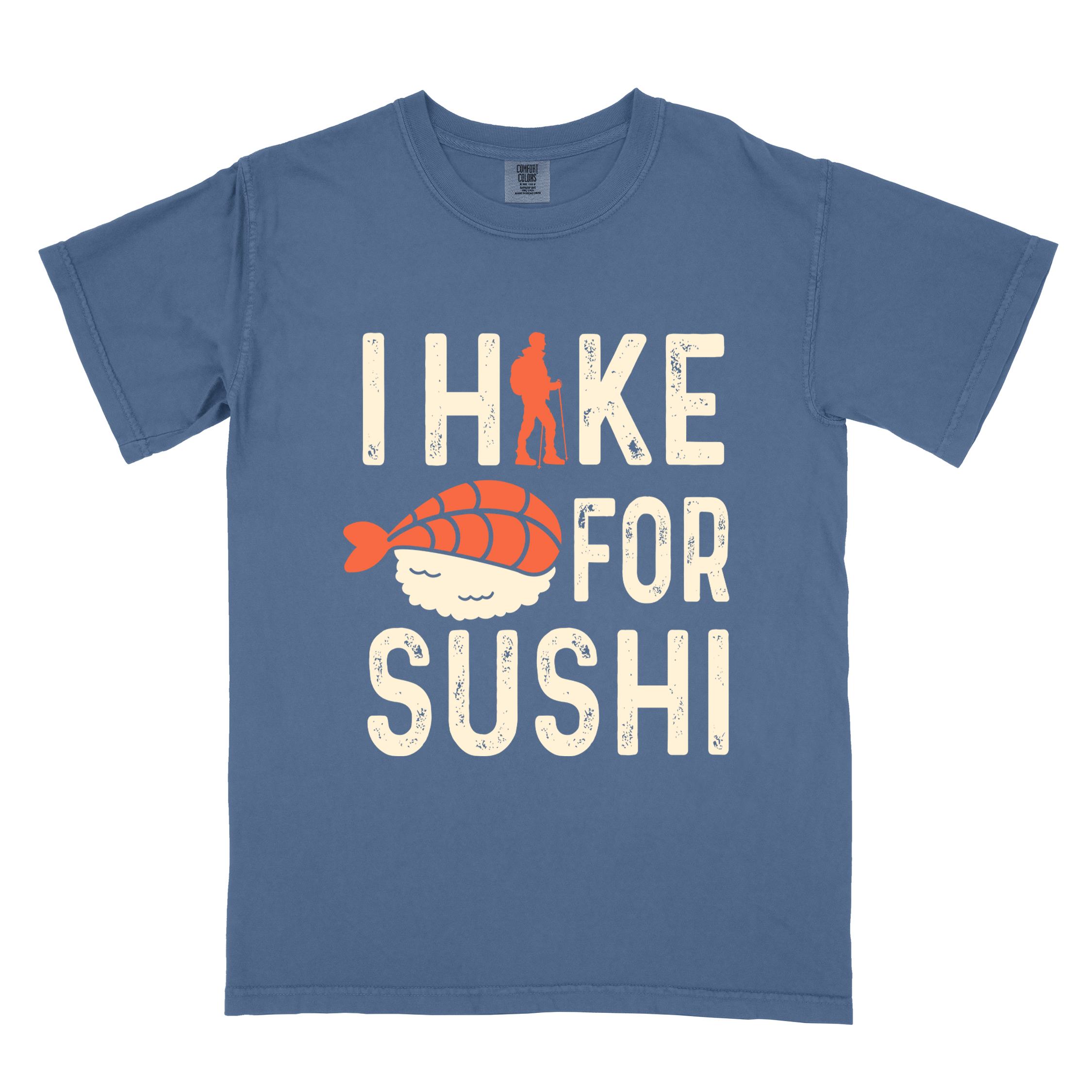 Blue jean 'I Hike for Sushi' text in cream lettering, illustrated shrimp sushi, and backpacker for sushi lovers