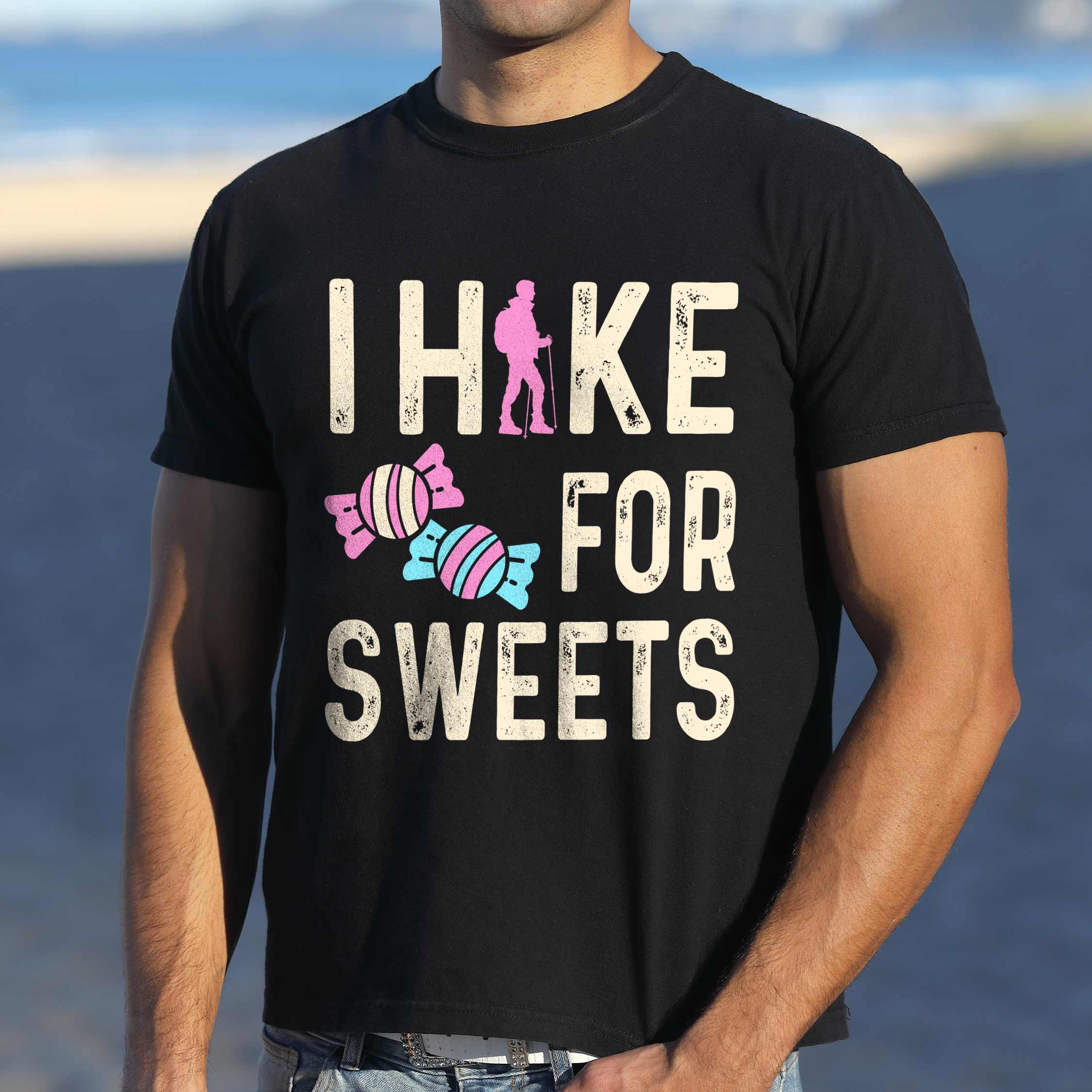 Man wearing black 'I Hike for Sweets' text in cream lettering, illustrated pieces of candies, and backpacker for candy lovers