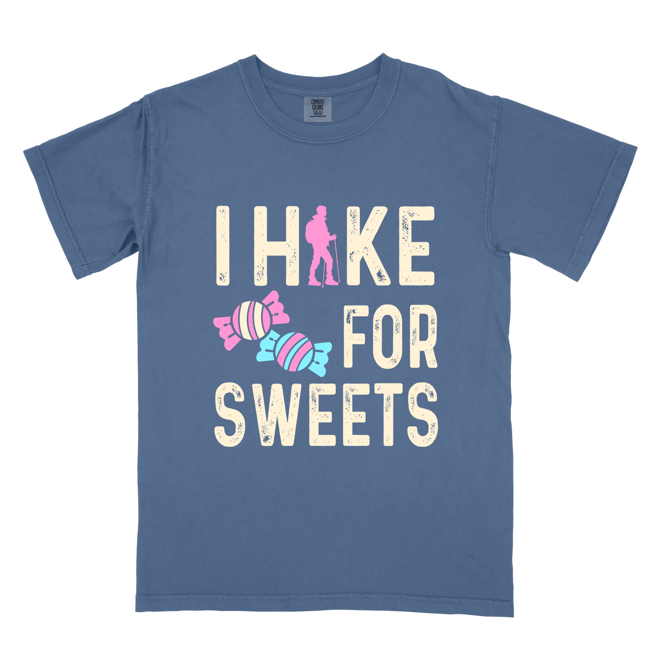 Blue jean 'I Hike for Sweets' text in cream lettering, illustrated pieces of candies, and backpacker for candy lovers