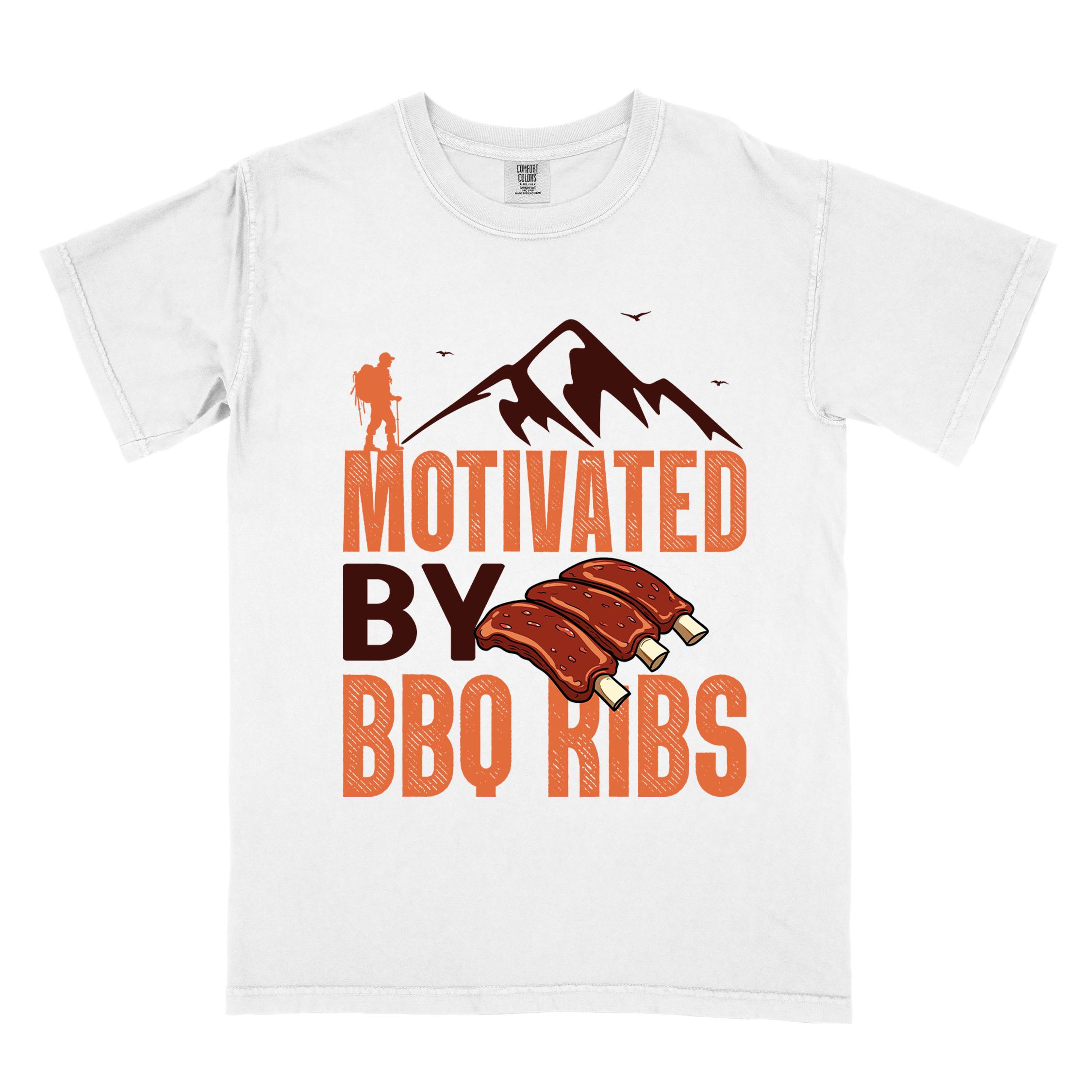 White "Motivated by BBQ ribs" colored vintage tee with bold typography, mountains, juicy grilled bbq ribs illustration, and backpacker for bbq enthusiasts