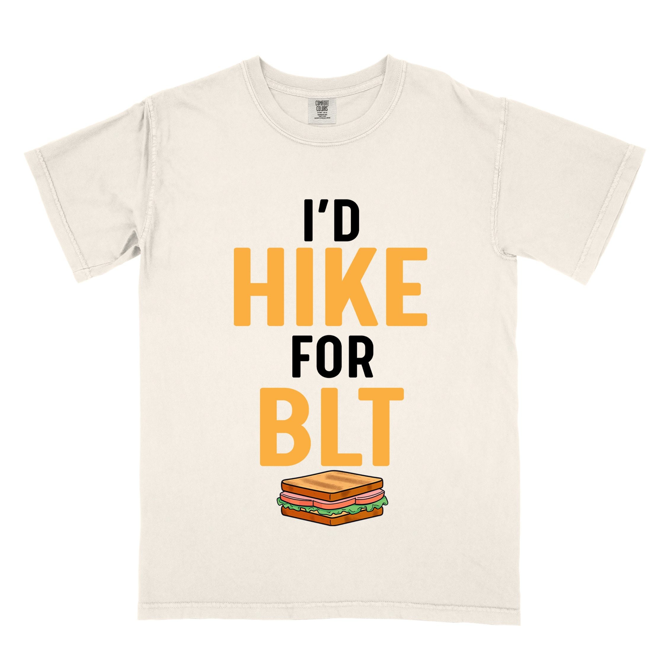 Ivory "I'd Hike for BLT" colored vintage tee with bold typography, toasted BLT sandwich illustration, perfect for sandwich lovers
