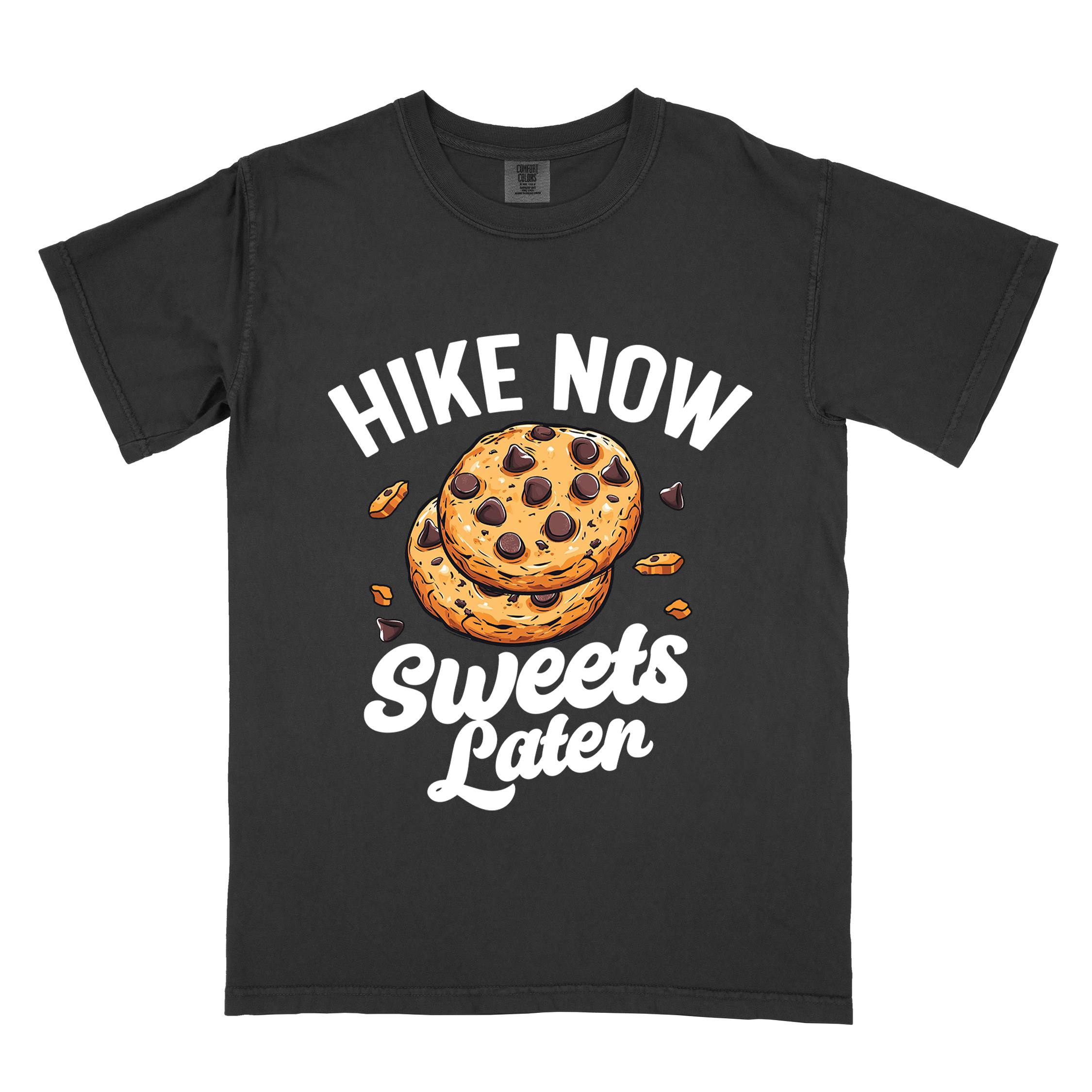 Black “Hike Now Sweets Later” colored vintage tee with bold and script typography, illustration of chocolate chip cookies with crumbs scattered around. Perfect for cookie lovers.