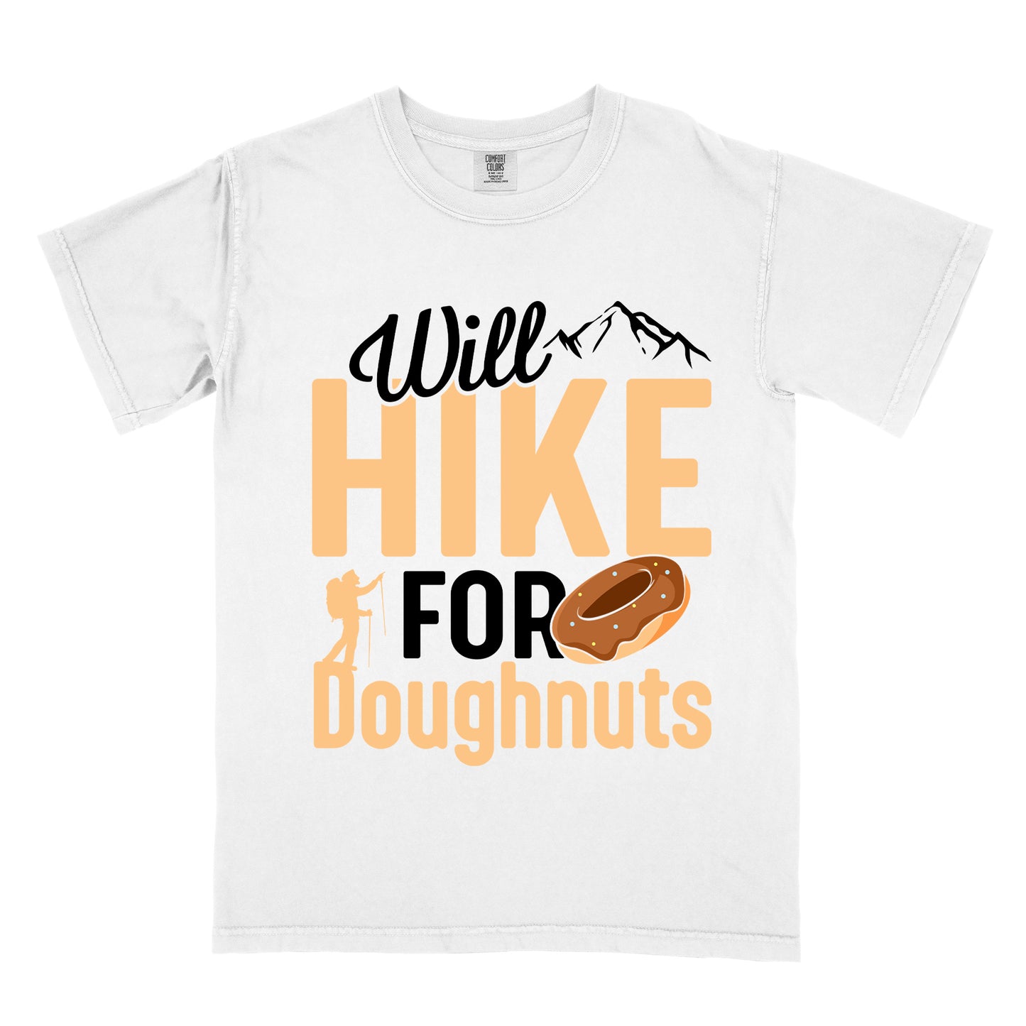 White t-shirt with "Will HIKE FOR Doughnuts" graphic design. Black script "Will" above tan "HIKE" in bold letters, with small mountain peaks above. "FOR" appears in black, followed by "Doughnuts" in tan, with an illustrated chocolate donut replacing the "O" in "FOR". Features a small hiker silhouette. 