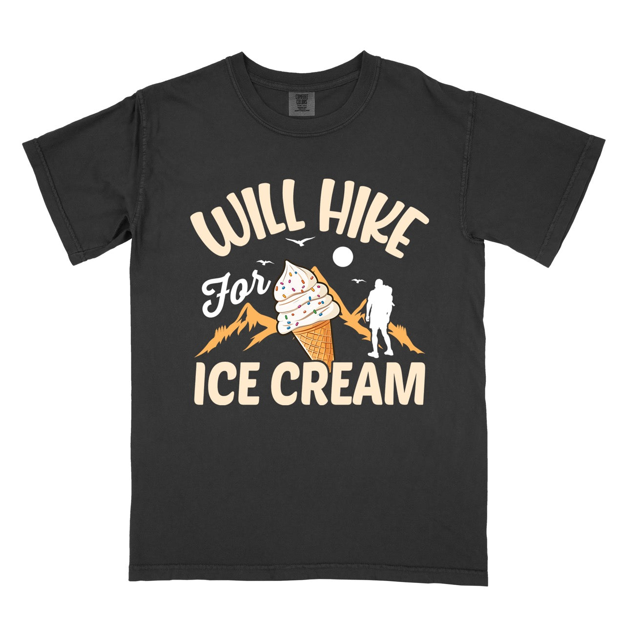 Black Will Hike for Ice Cream statement tee with curved typography, script lettering, mountain peaks, hiker silhouette, and ice cream cone illustration on Comfort Colors shirt for dessert-loving outdoor enthusiasts