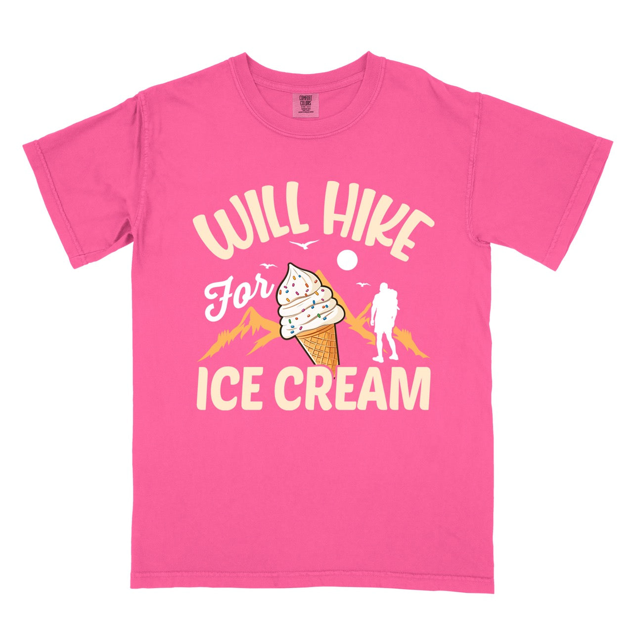 Crunchberry (bright pink) Will Hike for Ice Cream statement tee with curved typography, script lettering, mountain peaks, hiker silhouette, and ice cream cone illustration on Comfort Colors shirt for dessert-loving outdoor enthusiasts