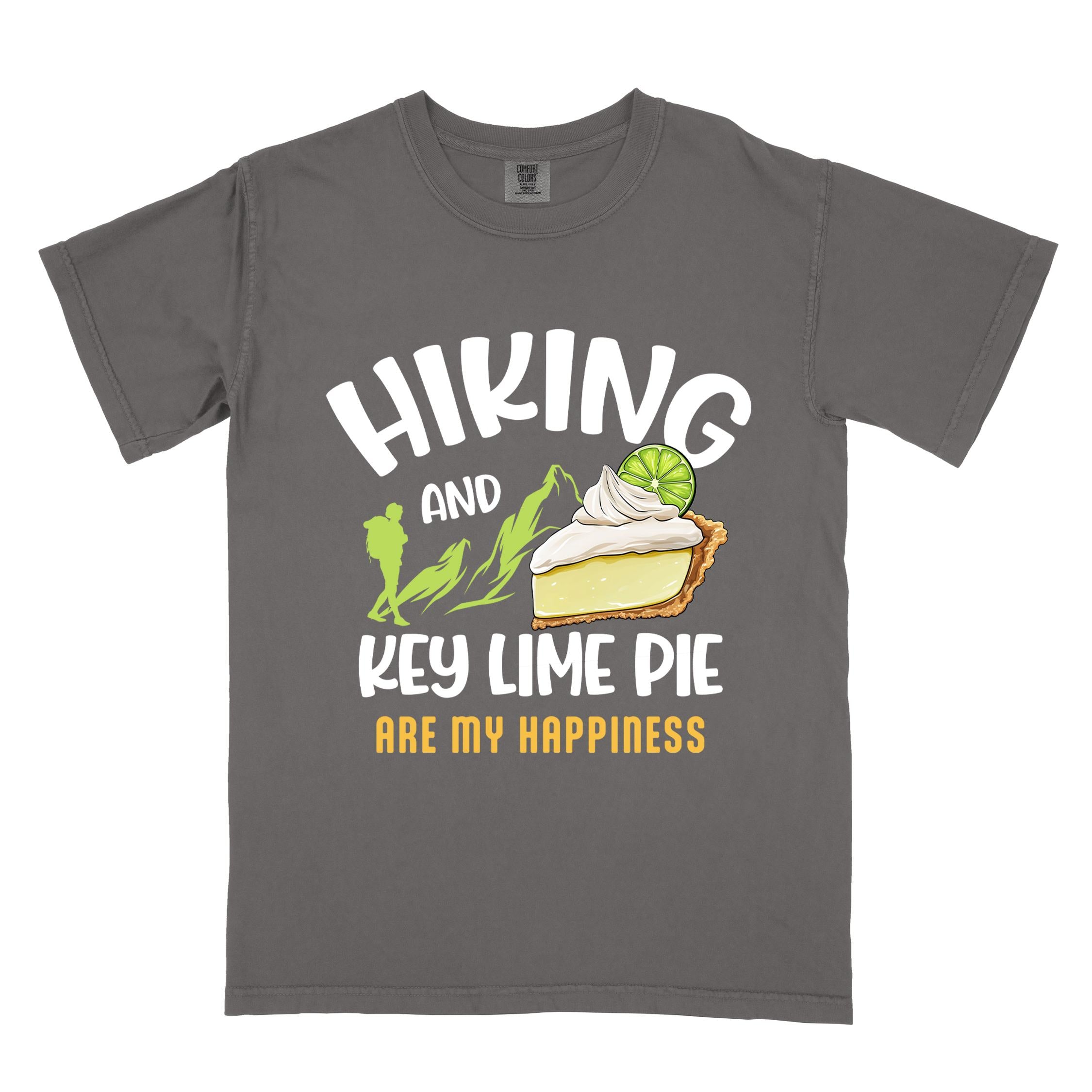 Pepper "Hiking and key lime pie are my happiness" colored vintage tee with bold typography, mountains, birds, illustrated slice of key lime pie, and backpacker for pie lovers.