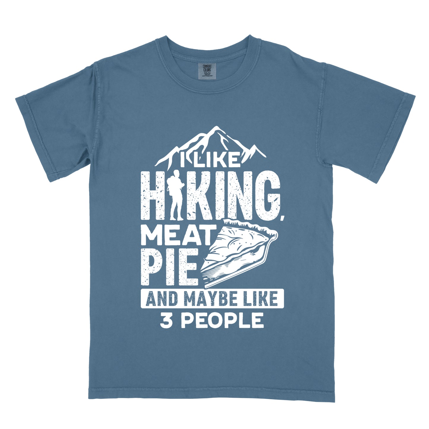 Blue Jean (Denim Blue) t-shirt with white distressed text reading "I LIKE HIKING, MEAT PIE AND MAYBE LIKE 3 PEOPLE". Mountain silhouettes appear above "I LIKE". The letter "I" in "HIKING" is replaced with a hiker silhouette. Next to "MEAT PIE" is an illustration of a slice of pie. All text and graphics are in white with a weathered, vintage appearance. The design combines outdoor activities, food preferences, and introvert humor.