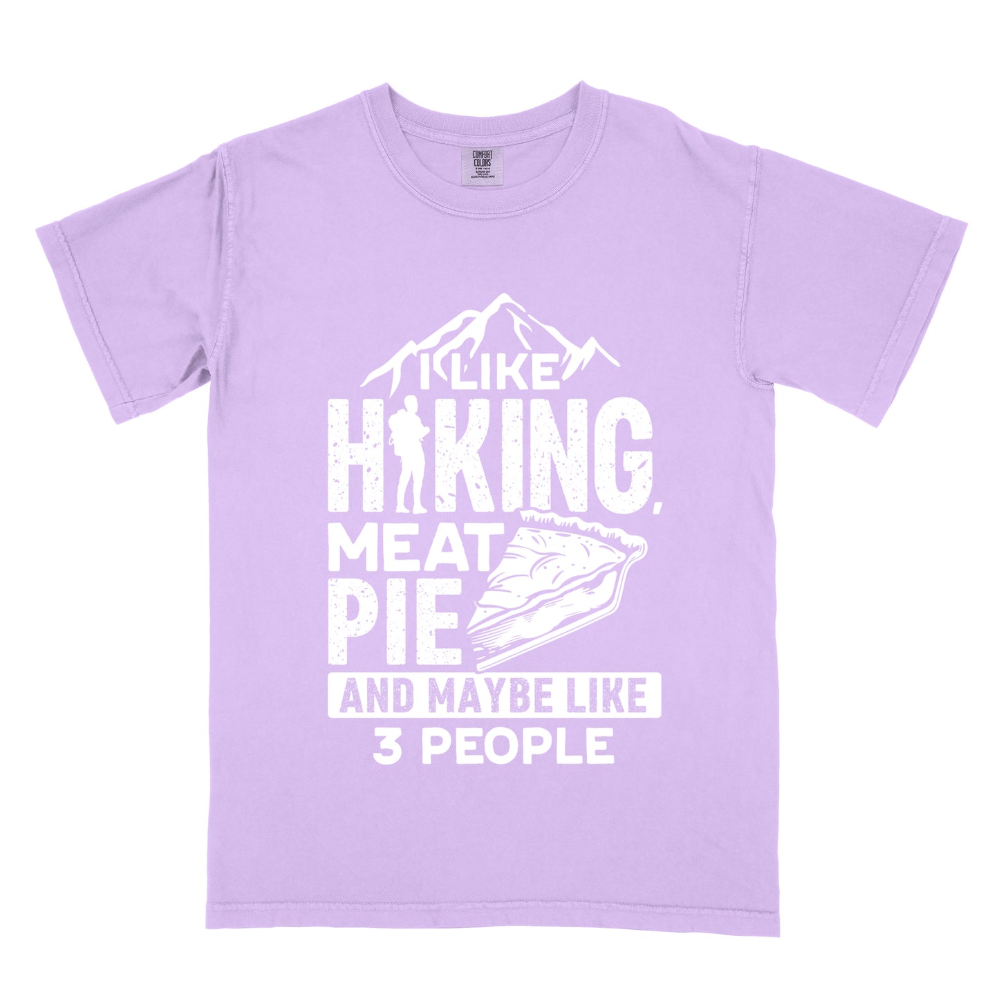 Orchid (Light Violet) t-shirt with white distressed text reading "I LIKE HIKING, MEAT PIE AND MAYBE LIKE 3 PEOPLE". Mountain silhouettes appear above "I LIKE". The letter "I" in "HIKING" is replaced with a hiker silhouette. Next to "MEAT PIE" is an illustration of a slice of pie. All text and graphics are in white with a weathered, vintage appearance. The design combines outdoor activities, food preferences, and introvert humor.