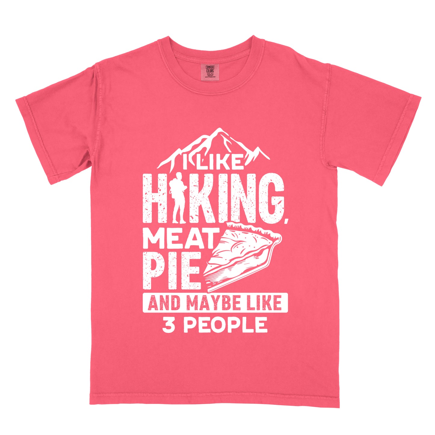 Watermelon (Light Coral) t-shirt with white distressed text reading "I LIKE HIKING, MEAT PIE AND MAYBE LIKE 3 PEOPLE". Mountain silhouettes appear above "I LIKE". The letter "I" in "HIKING" is replaced with a hiker silhouette. Next to "MEAT PIE" is an illustration of a slice of pie. All text and graphics are in white with a weathered, vintage appearance. The design combines outdoor activities, food preferences, and introvert humor.
