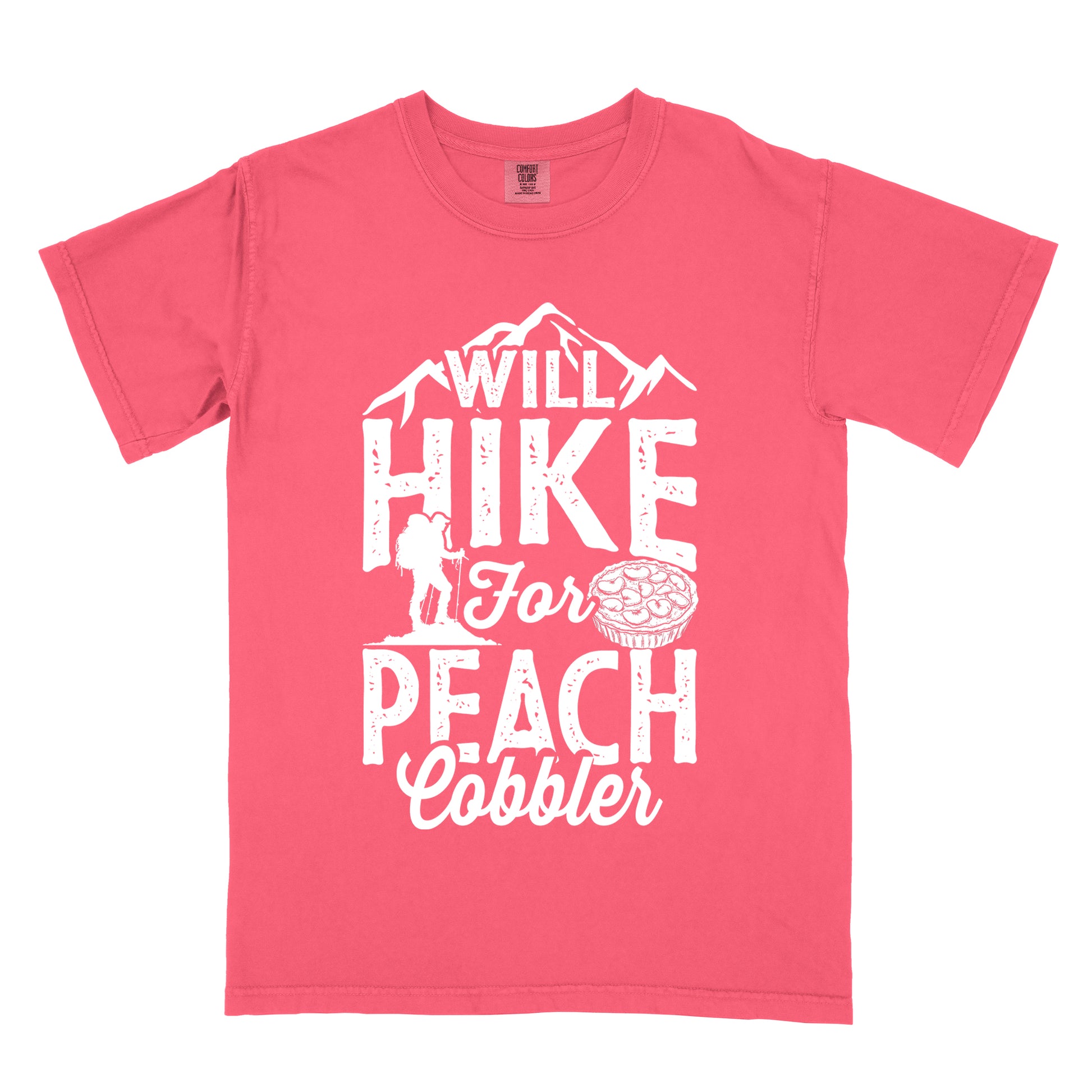 Watermelon (Light Coral) t-shirt with white text reading "WILL HIKE FOR PEACH COBBLER". "WILL HIKE" appears in large distressed letters at the top with mountain silhouettes, "For" in white script across the middle, and "PEACH COBBLER" in large distressed letters at the bottom. The design includes a small hiker figure with backpack on the left and an illustration of a peach cobbler pie. The design humorously connects hiking activity with dessert motivation.