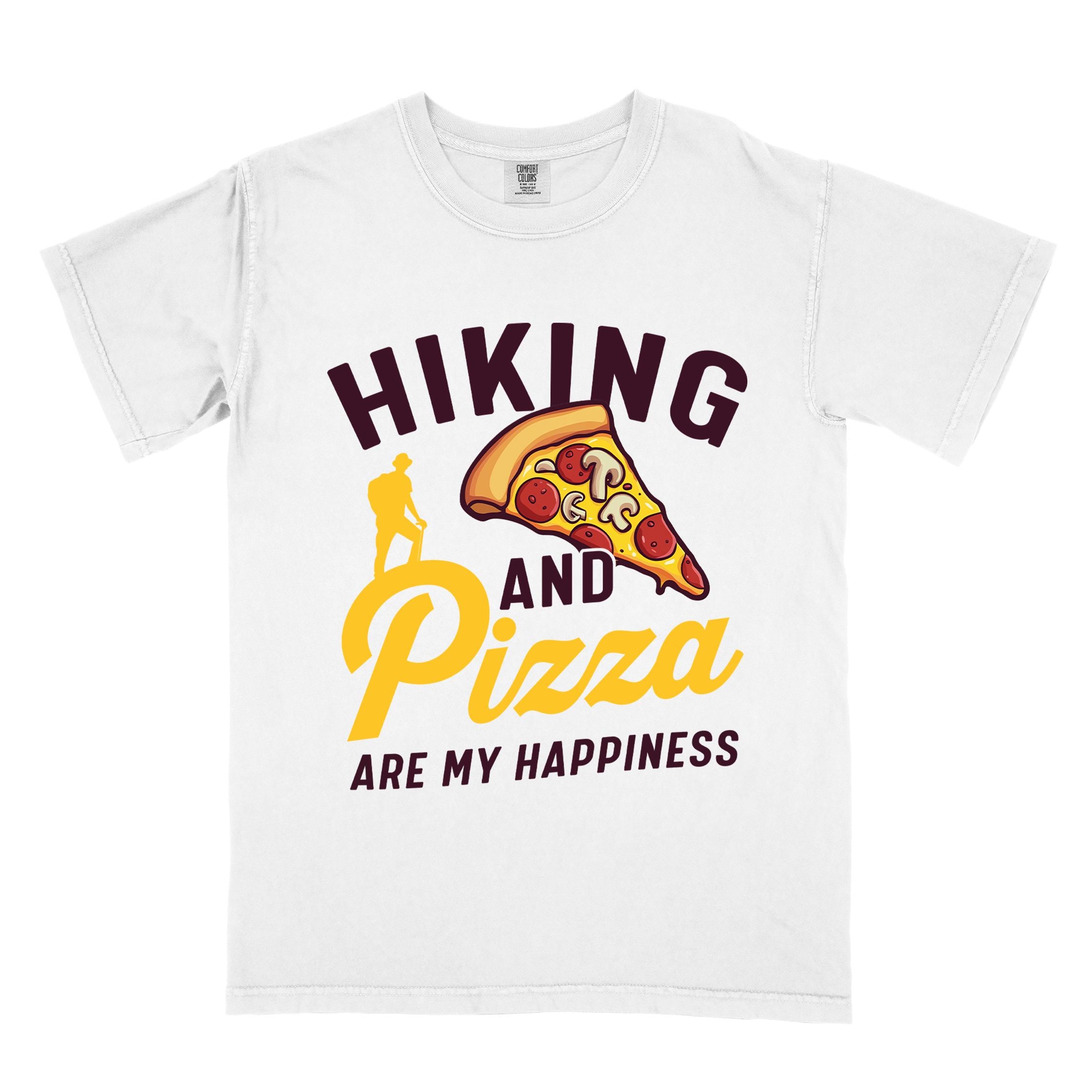 White "Hiking and Pizza are my happiness" colored vintage tee with bold typography, birds, mountains, illustrated pizza slice, and backpacker for pizza lovers.