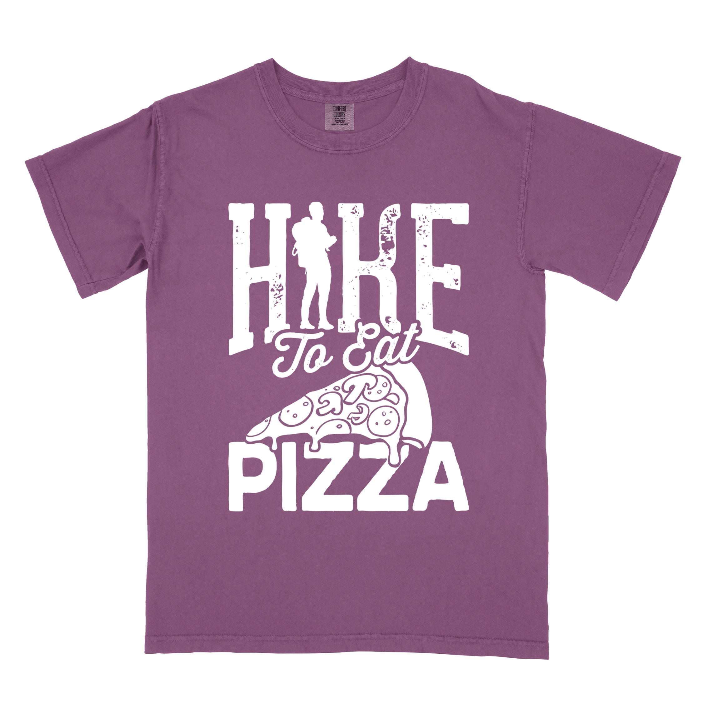 Berry "Hike to eat Pizza" colored vintage tee with bold typography, birds, mountains, illustrated pizza slice, and backpacker for pizza lover.