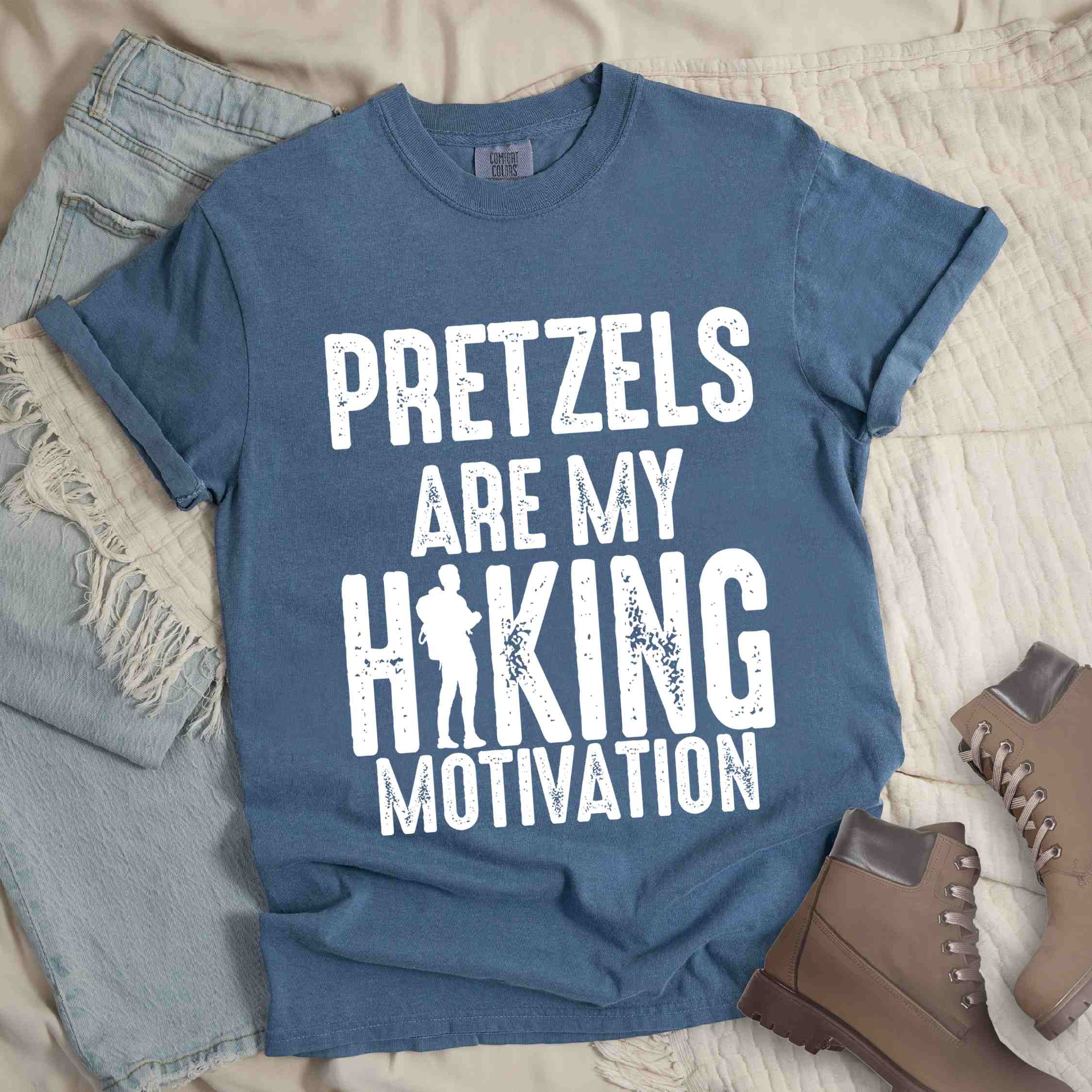 blue jean "Pretzels are my hiking motivation" colored vintage tee with bold typography, and backpacker for pretzel lovers.