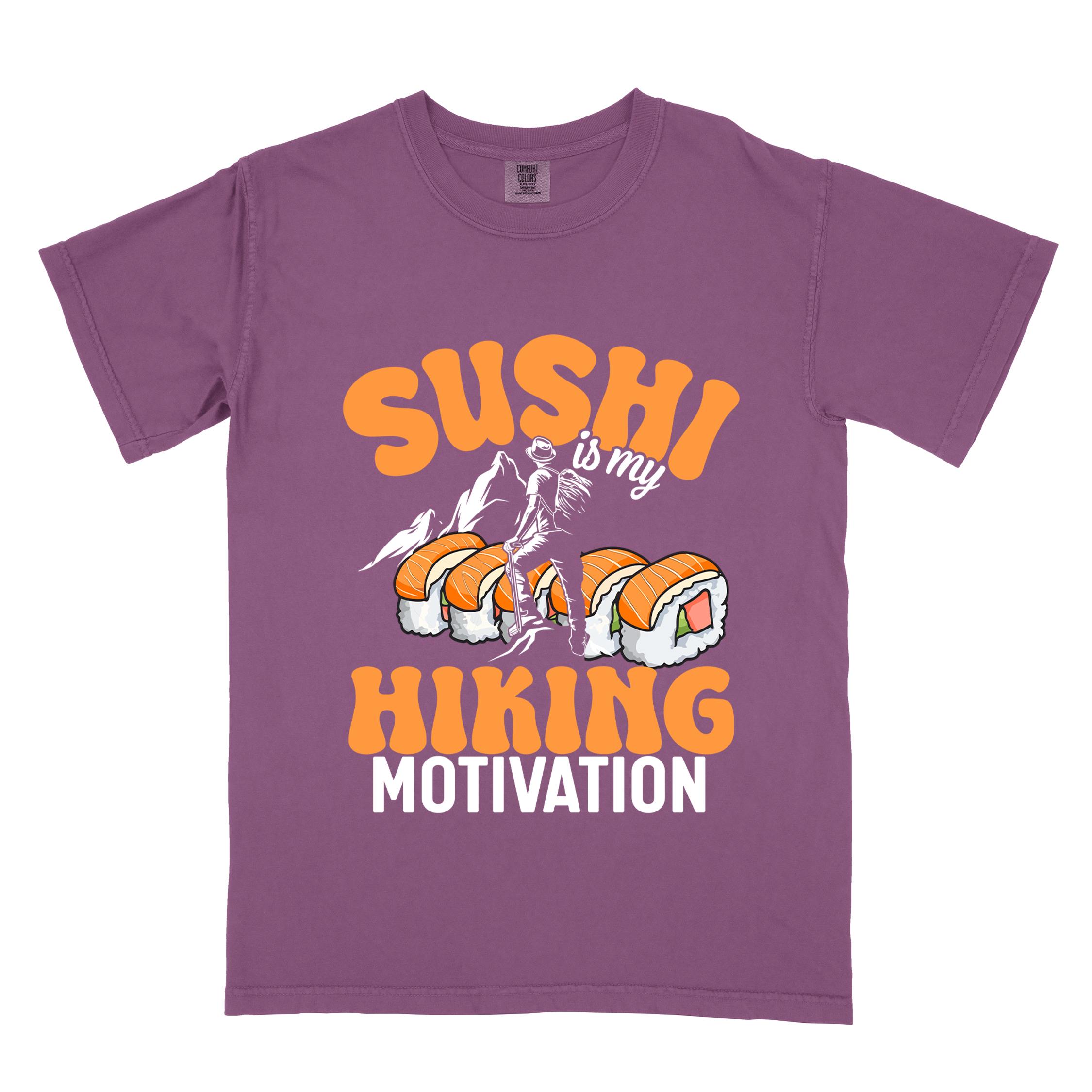 Berry "sushi is my hiking motivation" colored vintage tee with bold typography, birds, mountains, illustrated sushi platter, and backpacker for sushi lovers.