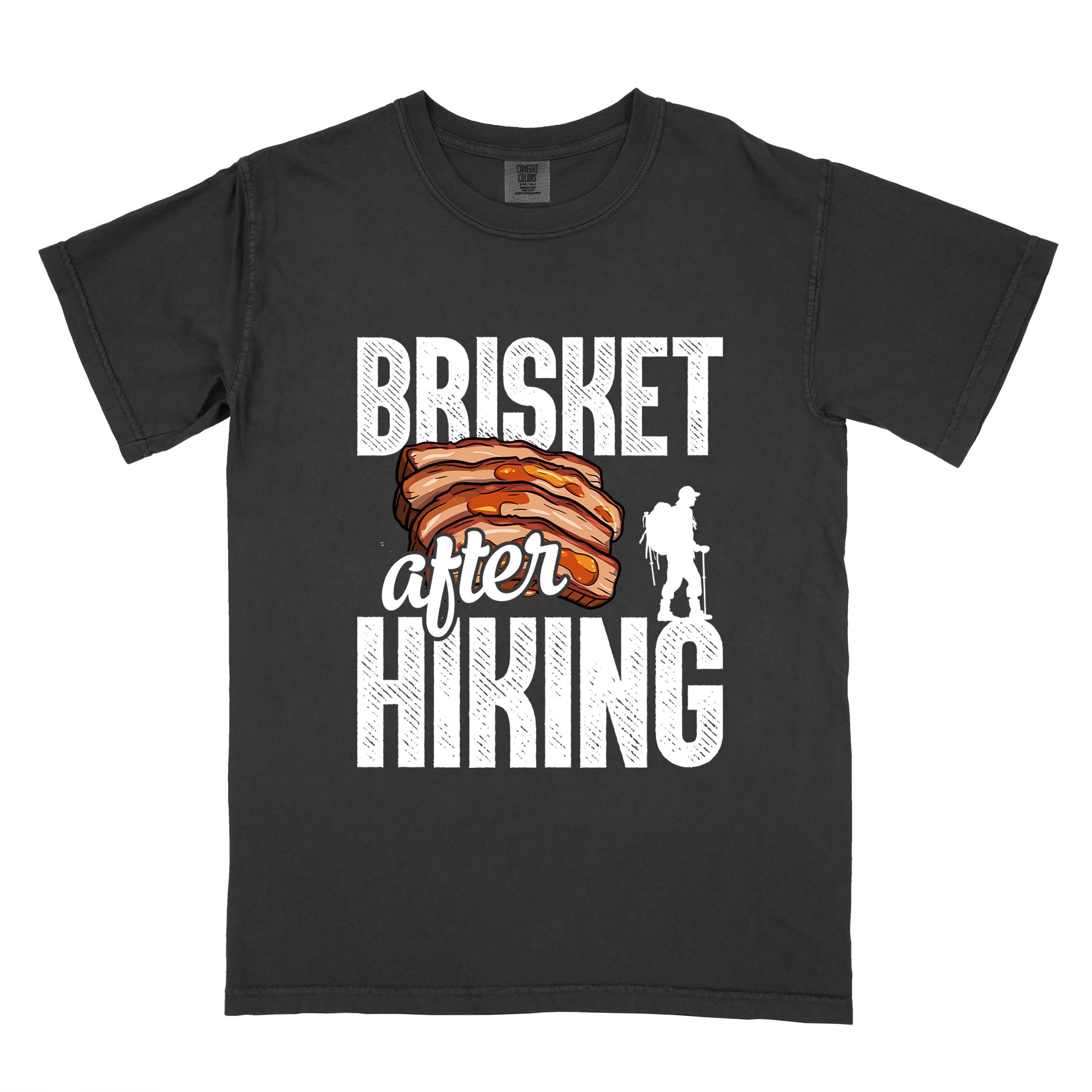 Black "Brisket after hiking" colored vintage tee with bold typography, birds, mountains, illustrated bbq beef brisket, and backpacker for bbq lovers.