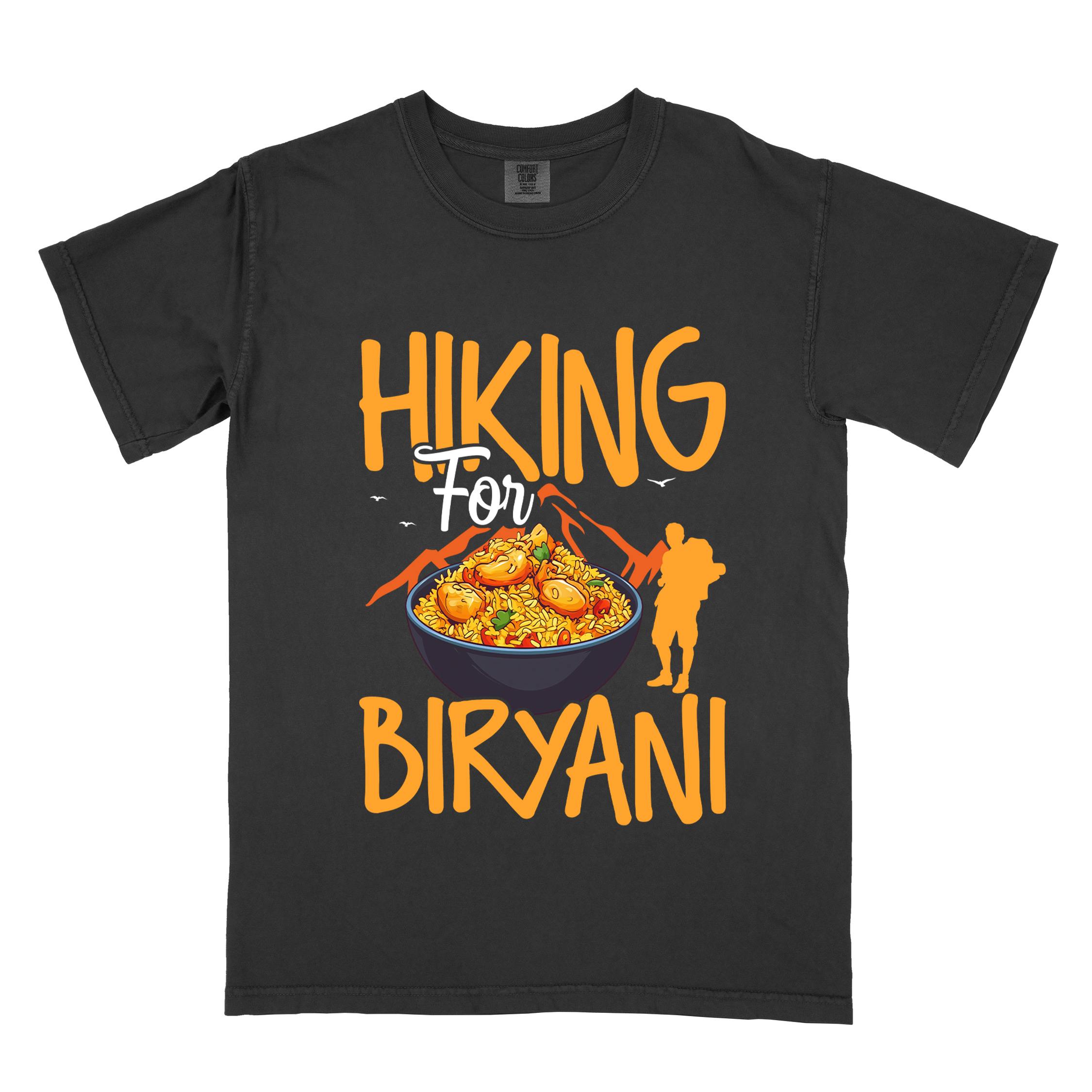 Black "Hiking for Biryani" colored vintage tee with bold typography, birds, mountains, illustrated bowl of biryani rice, and backpacker for rice lovers.