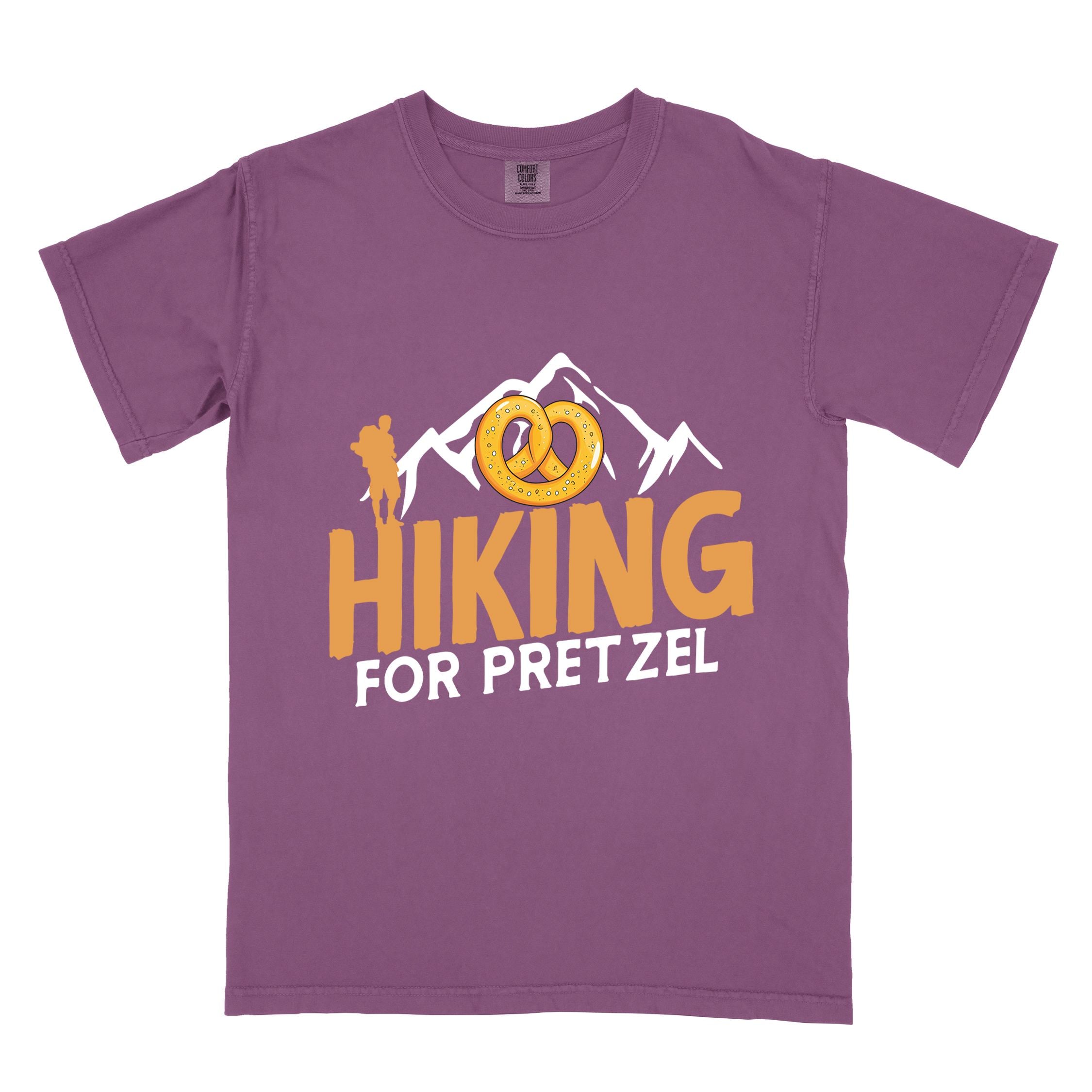 Berry "Hiking for pretzel" colored vintage tee with bold typography, mountains, birds, and illustrated pretzel for baked pretzel lovers
