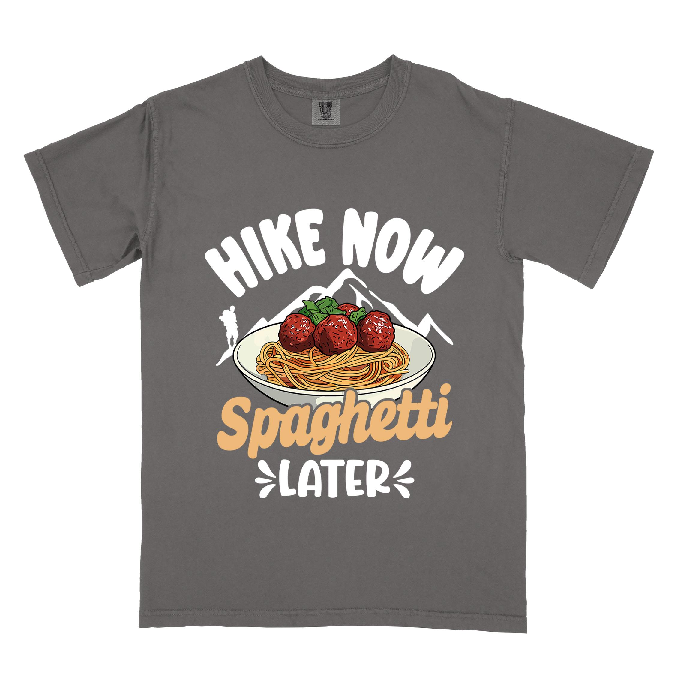 Pepper "Hike now spaghetti later" colored vintage tee with bold typography, mountains, birds, illustrated plate of spaghetti meatballs, and backpackers for pasta lovers.